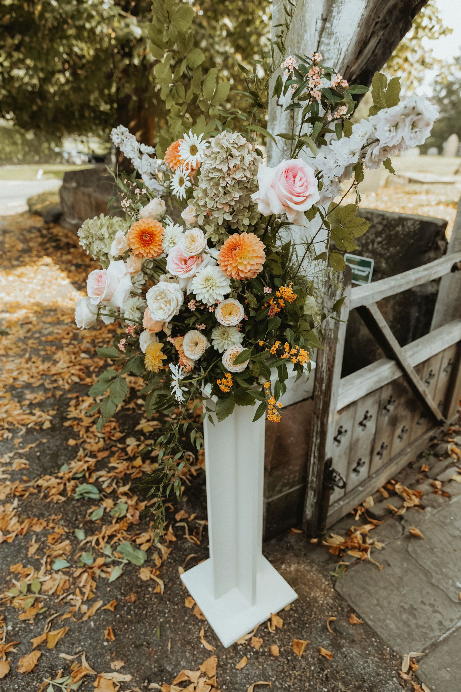 Colourful flower arrangement outside St Wilfrids church in Mobberley