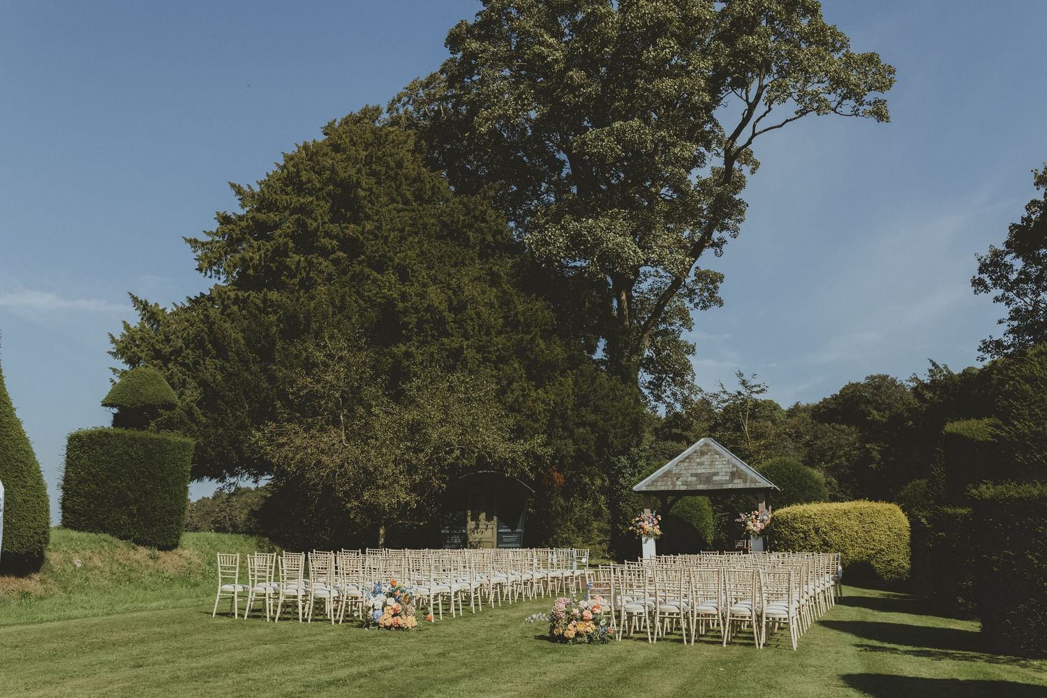 Outdoor ceremony space at Askham Hall in Penrith the Lake District on a sunny summers day.
