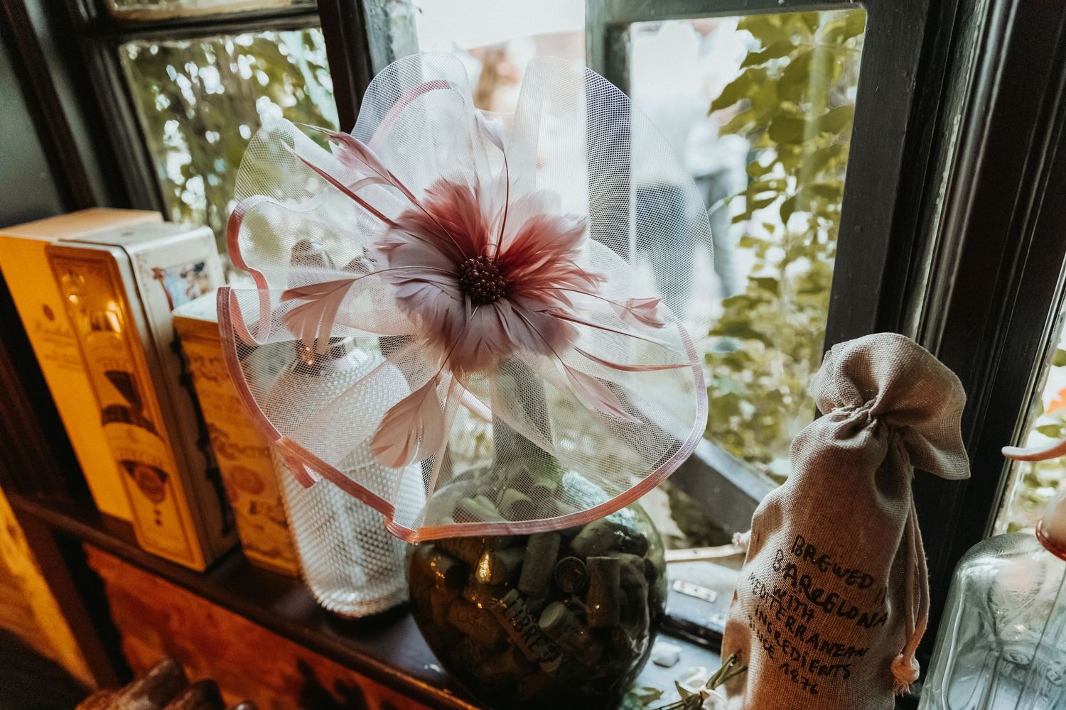 Women's wedding fascinator left on window sill at the Roebuck Inn