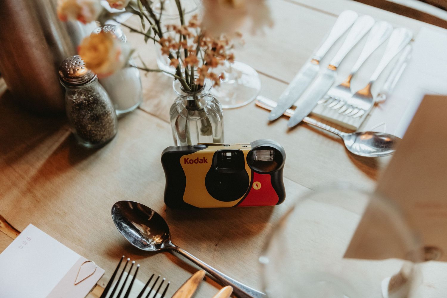 Disposable Kodak camera on wedding tables at The Roebuck Inn