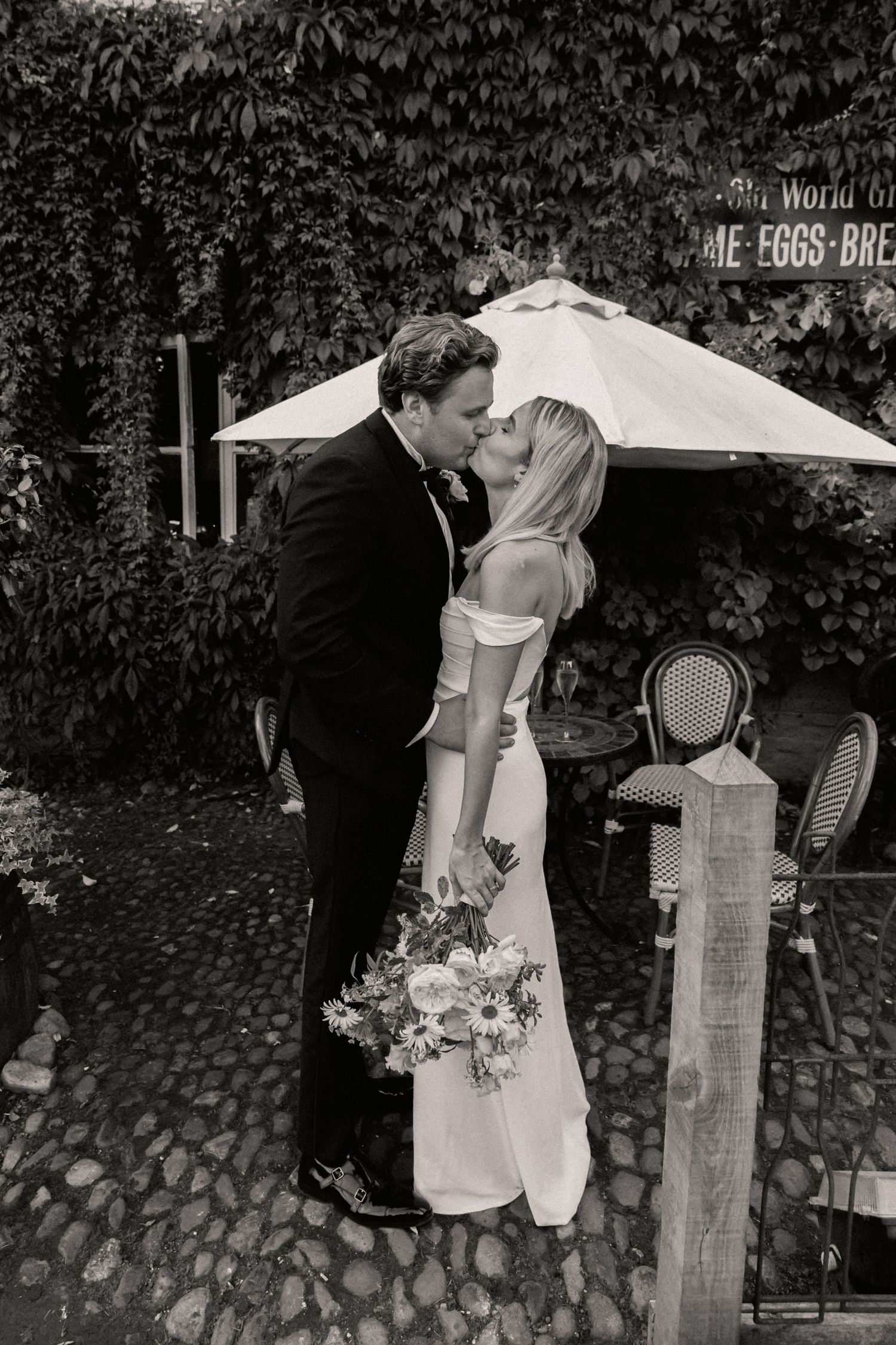 Bride and groom sharing a kiss on their wedding day