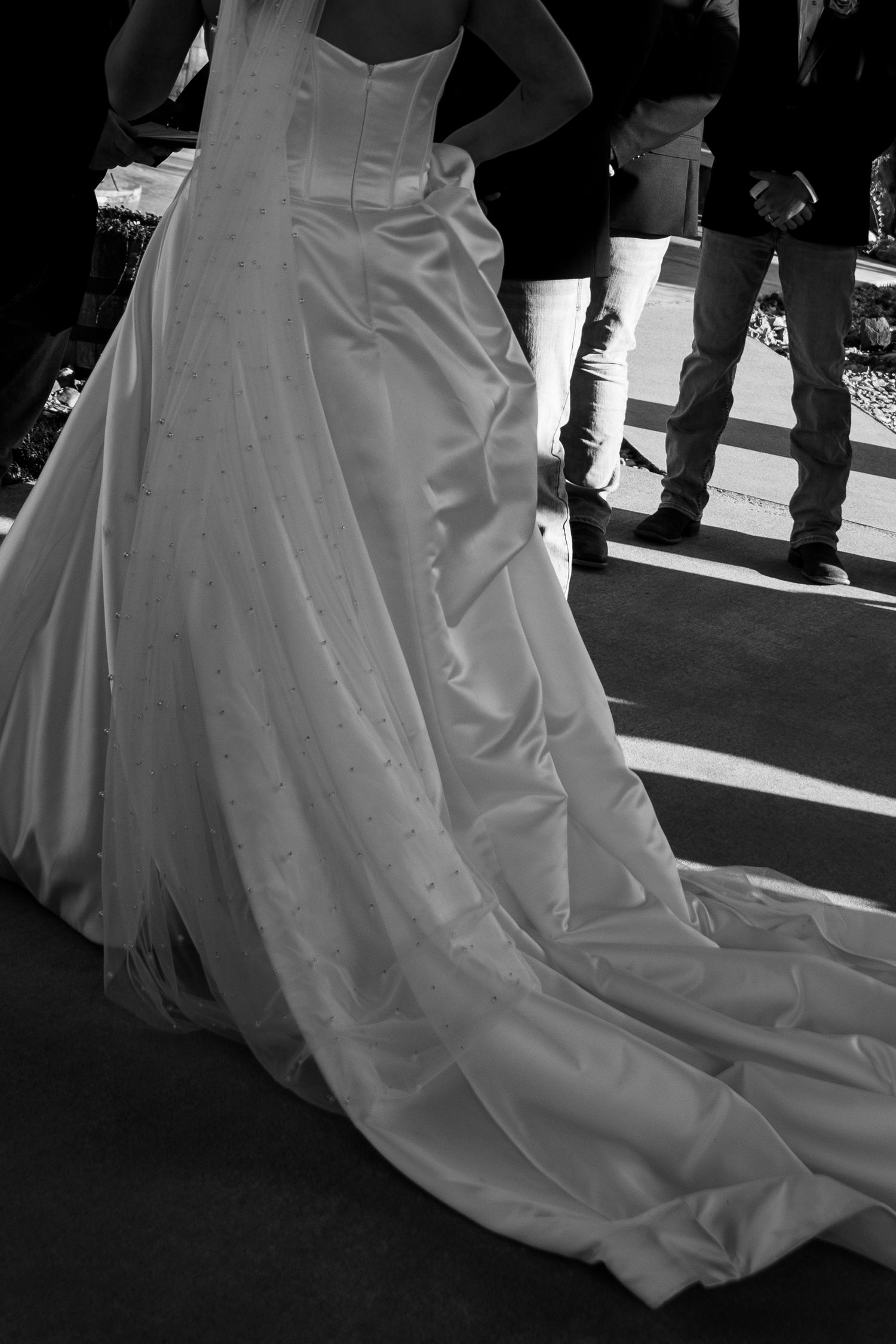 brides dress detail shot as she walks away