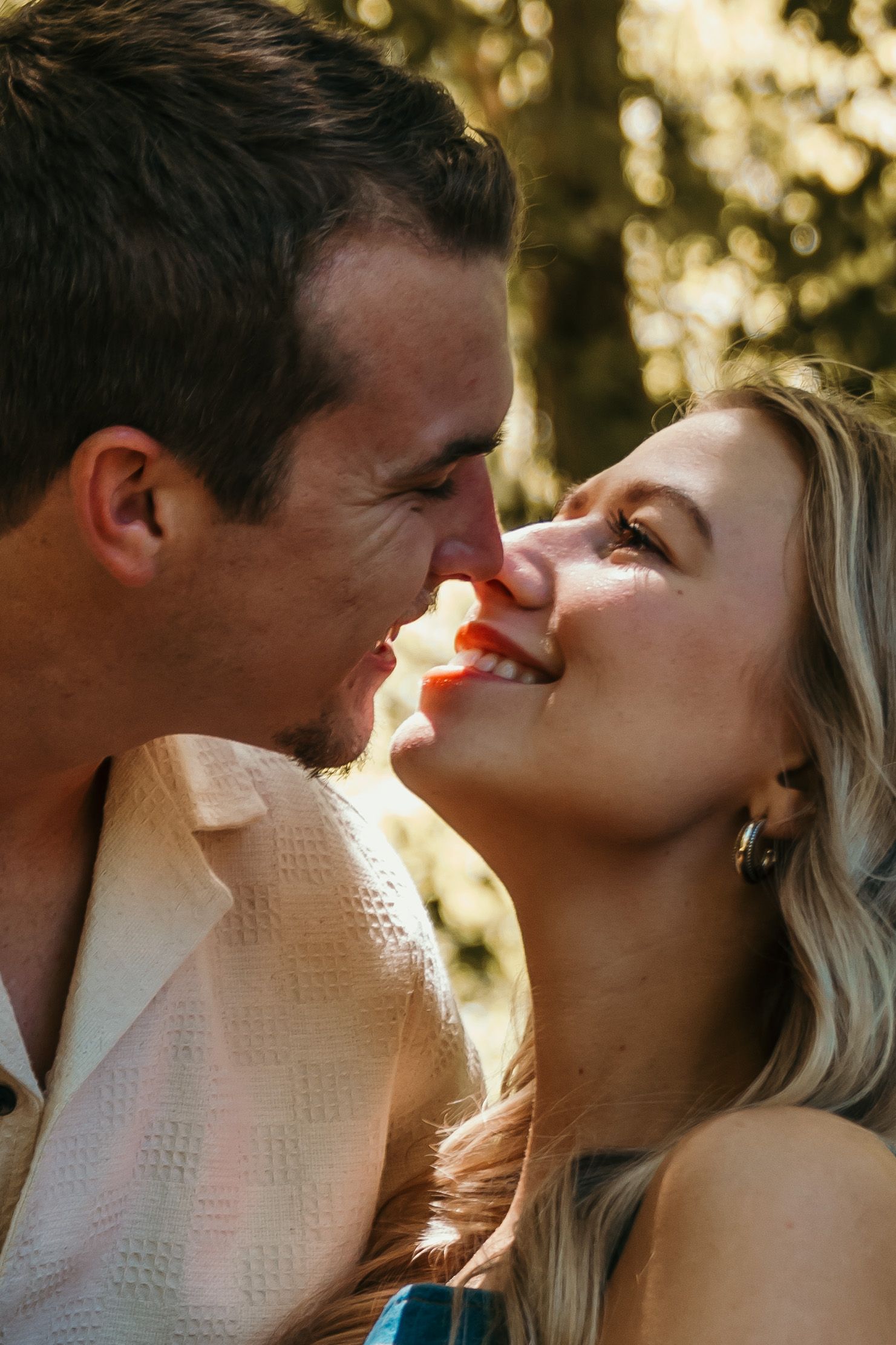 boy and girl nose to nose gazing into each others eyes