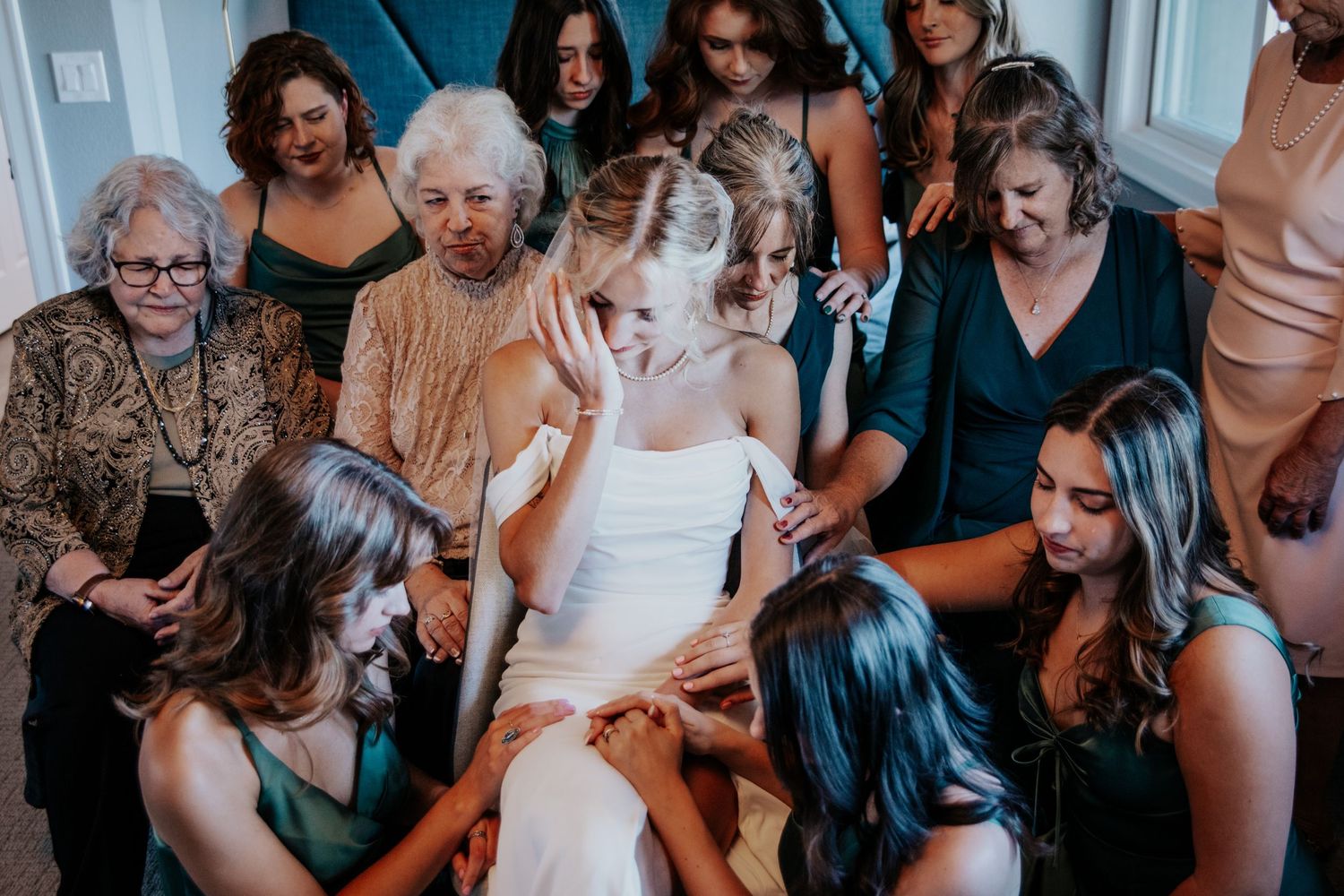 Guests celebrating at a joyful wedding reception gathering.