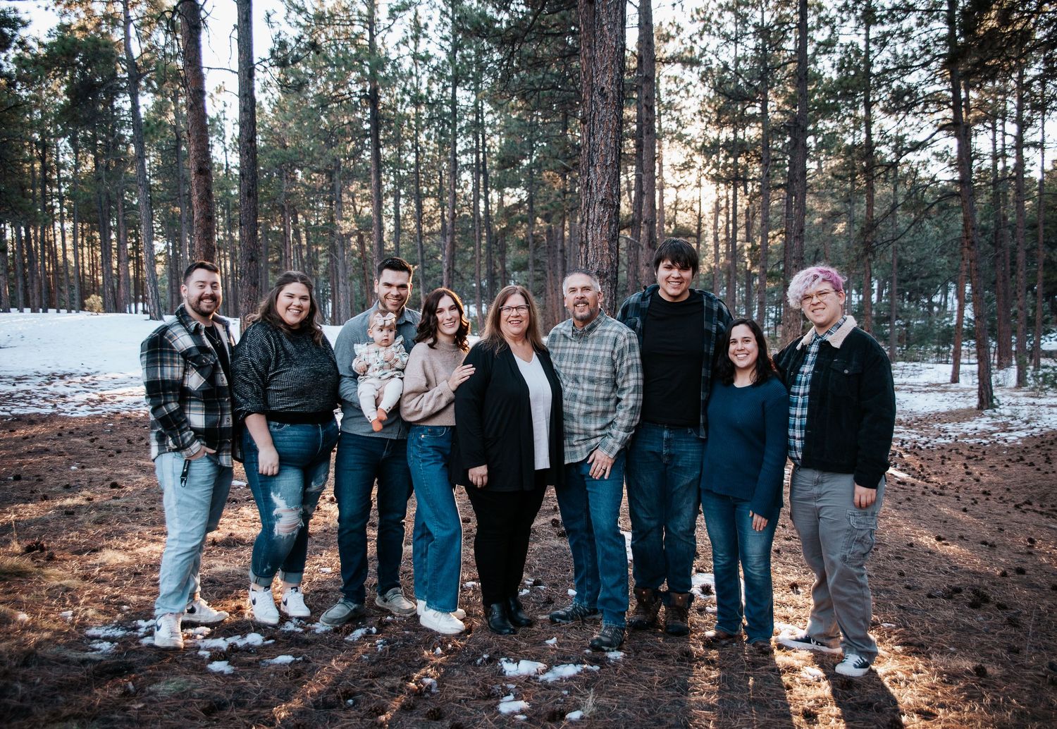 Large family during winter outdoor family photo session at Fox Run Park in Colorado Springs