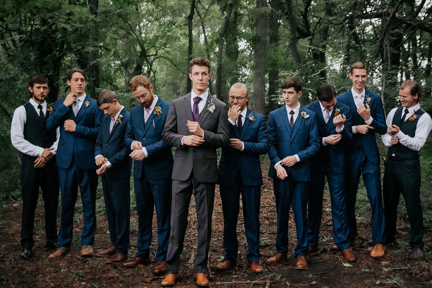Serious photo of groomsmen in Kansas City, from Colorado Springs wedding photographer Jasmine Morse