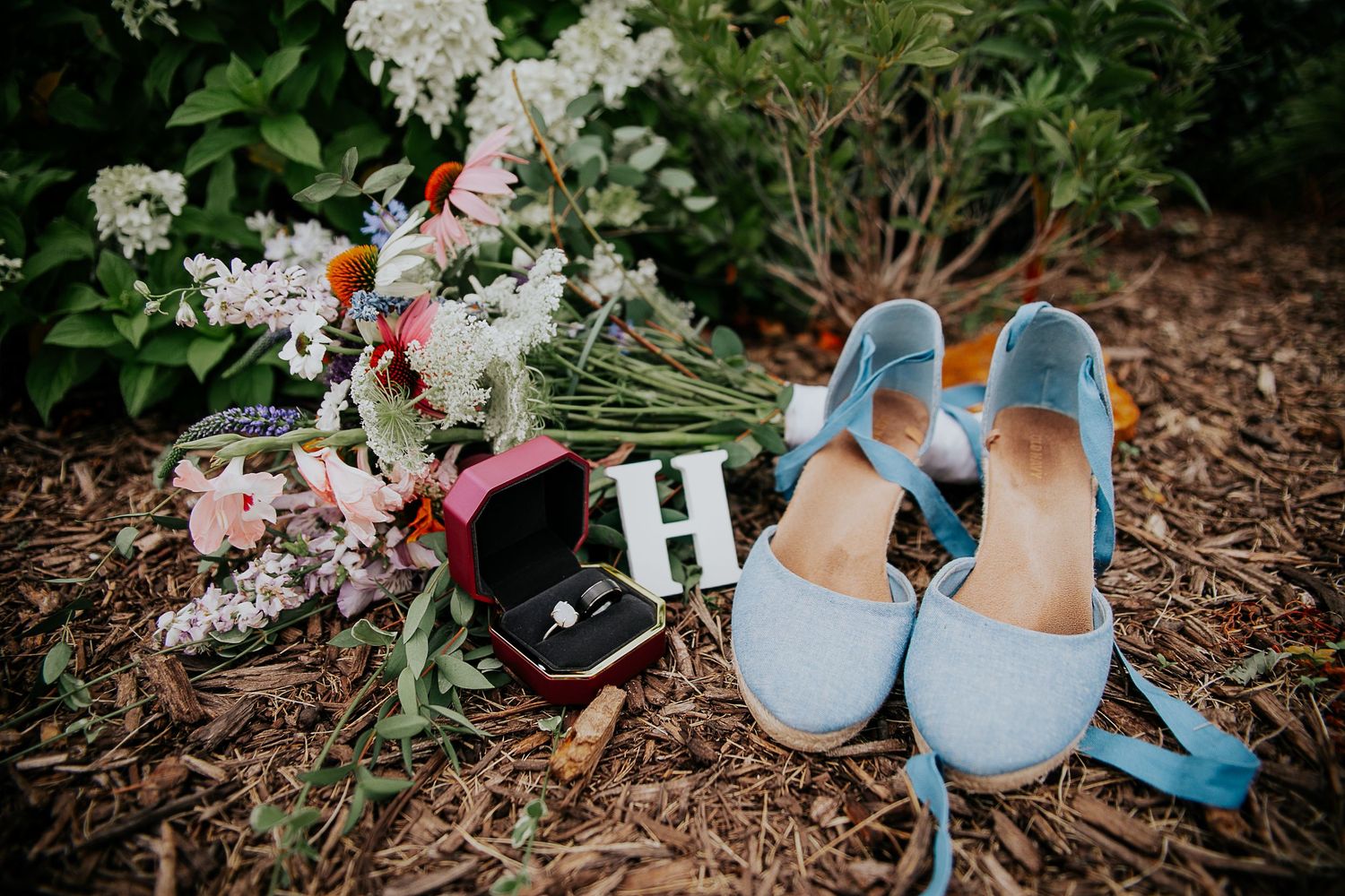 Close up of wedding details during a summer wedding, from Colorado Springs wedding photographer Jasmine Morse