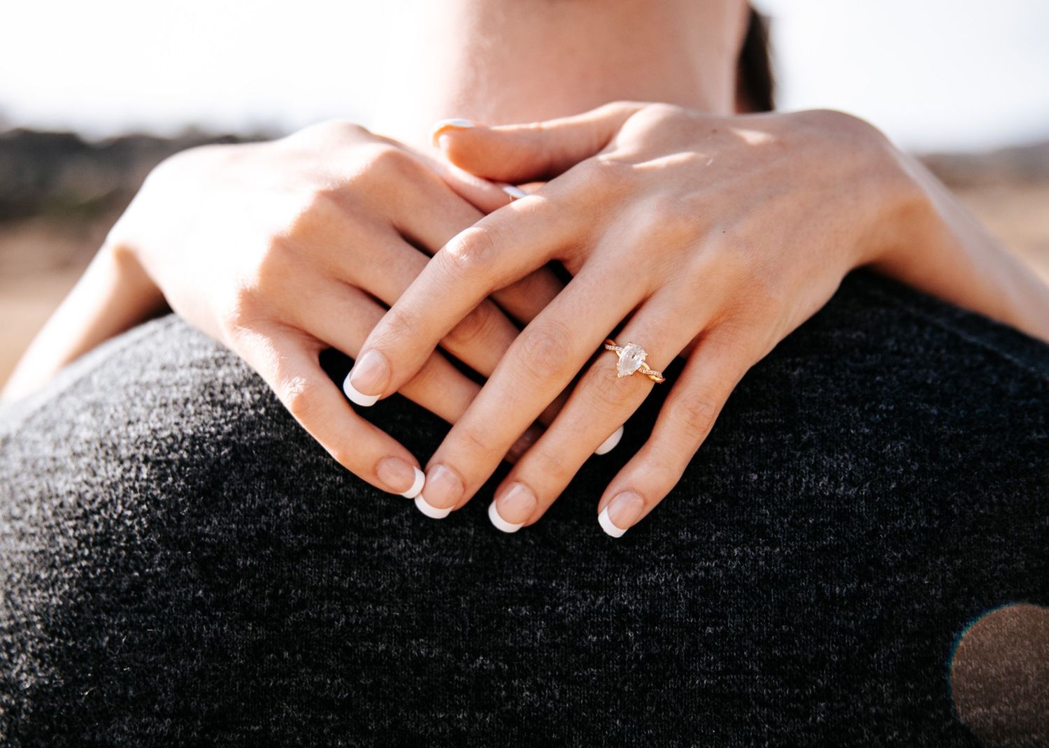 Close up shot of engagement ring during engagement photo session at Red Rock Open Space in Colorado Springs