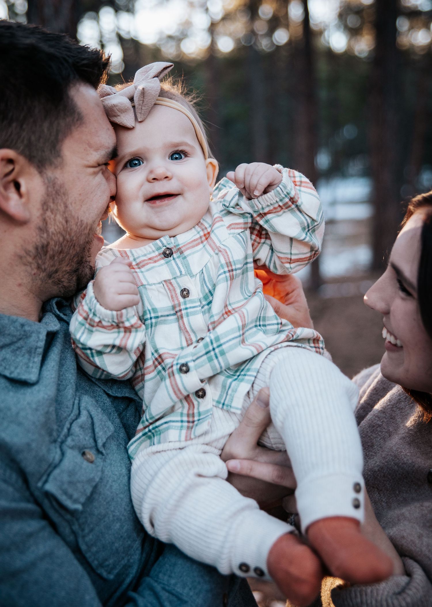 Close up of a baby during winter outdoor family photo session at Fox Run Park in Colorado Springs
