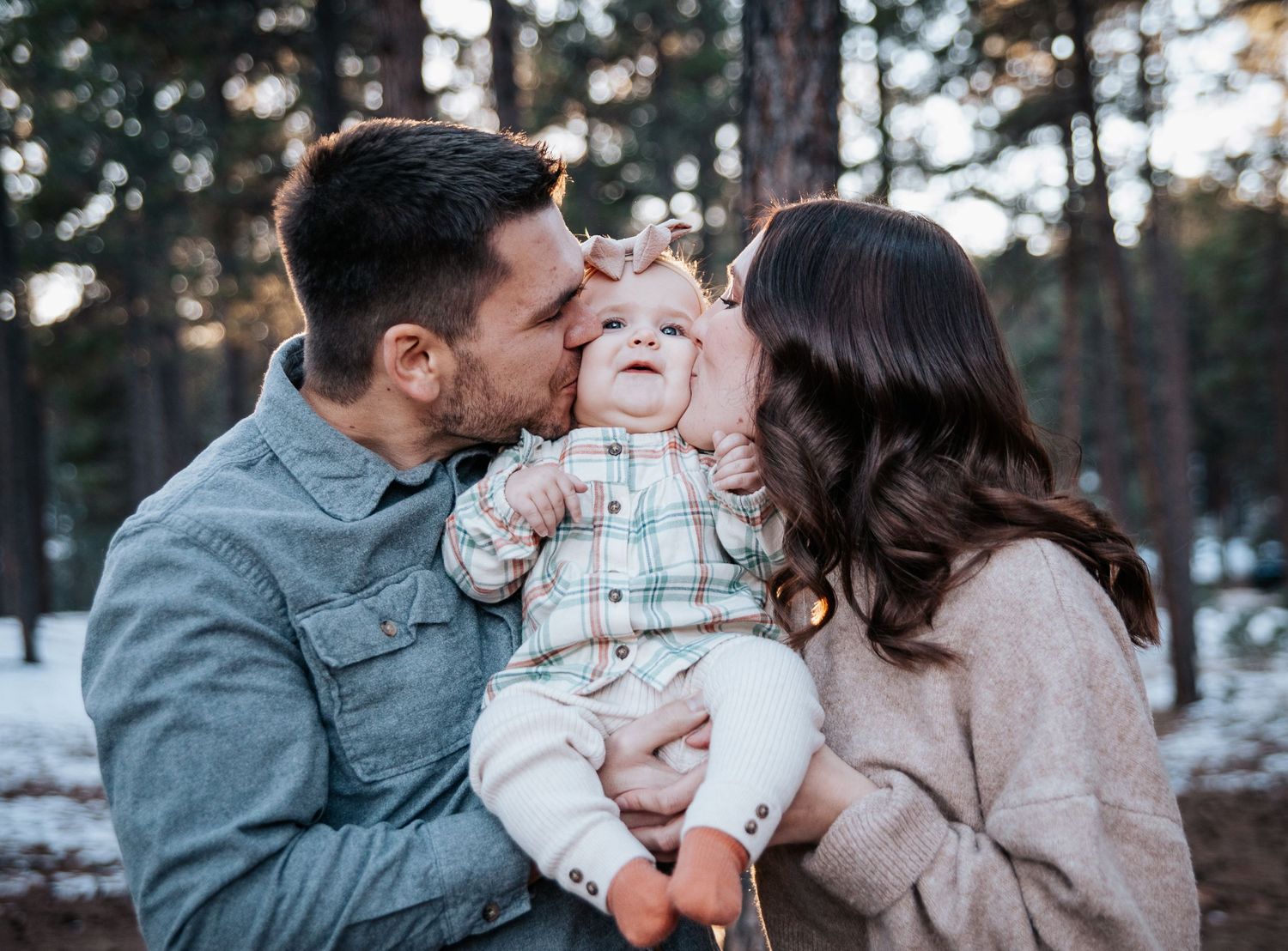 A sweet family moment captured in a series of intimate photos outdoors.