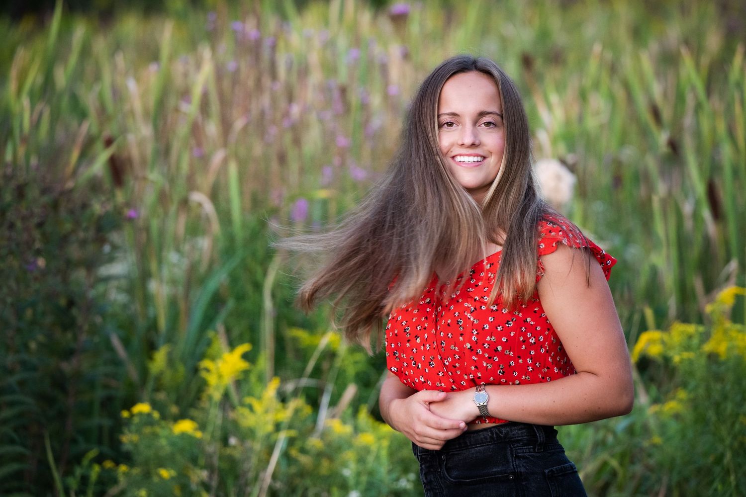 A series of outdoor portrait photographs taken in a field with tall grass and wildflowers during golden hour.