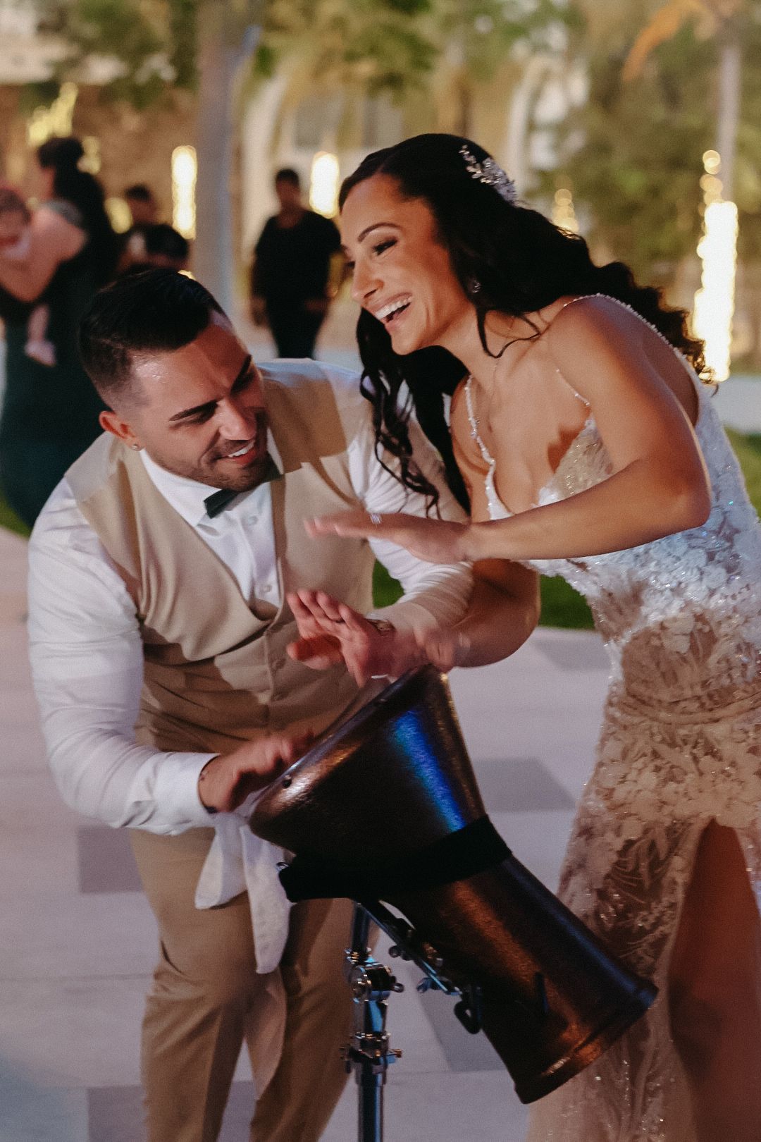 A bride and groom celebrating their destination wedding during a beautiful outdoor photo session in Mexico.