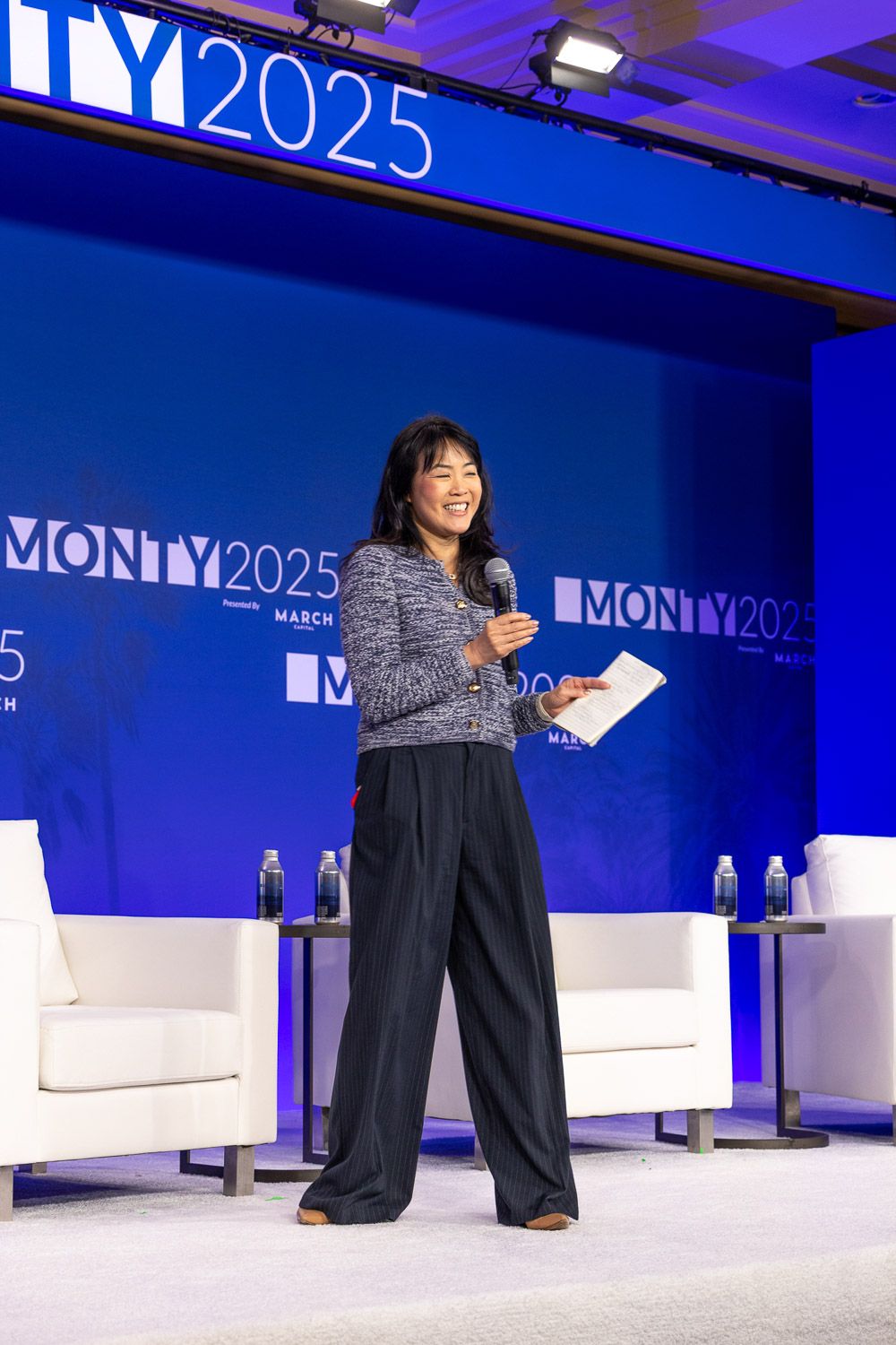 Keynote speaker presenting on stage a the Montgomery Summit 2025.