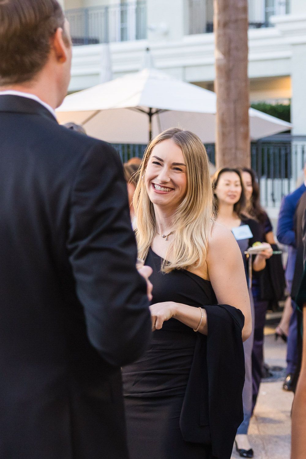 Guests mingling at outdoor event reception gala event.