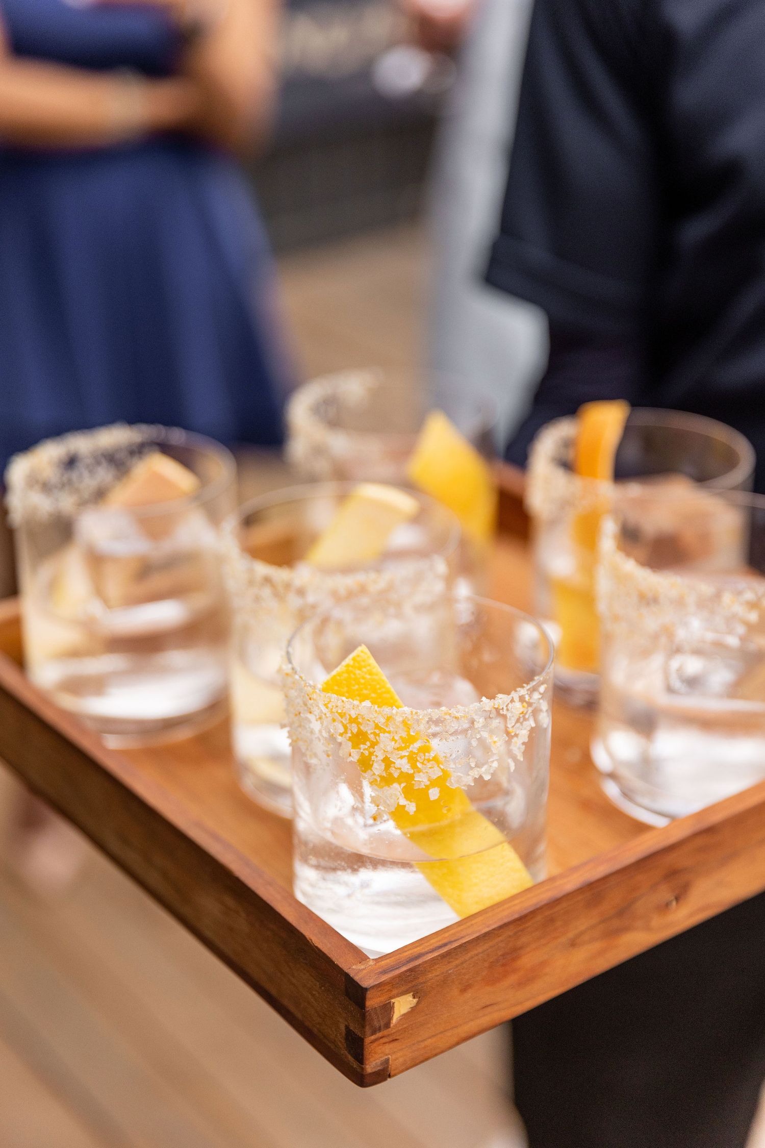 Commercial lifestyle product shot featuring detailed close-ups of filled glasses at a Tequila launch event by Tucara Photography