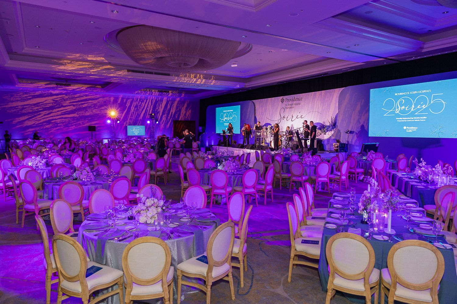 Wide shot of a ballroom before guest are invited to enter for dinner.
