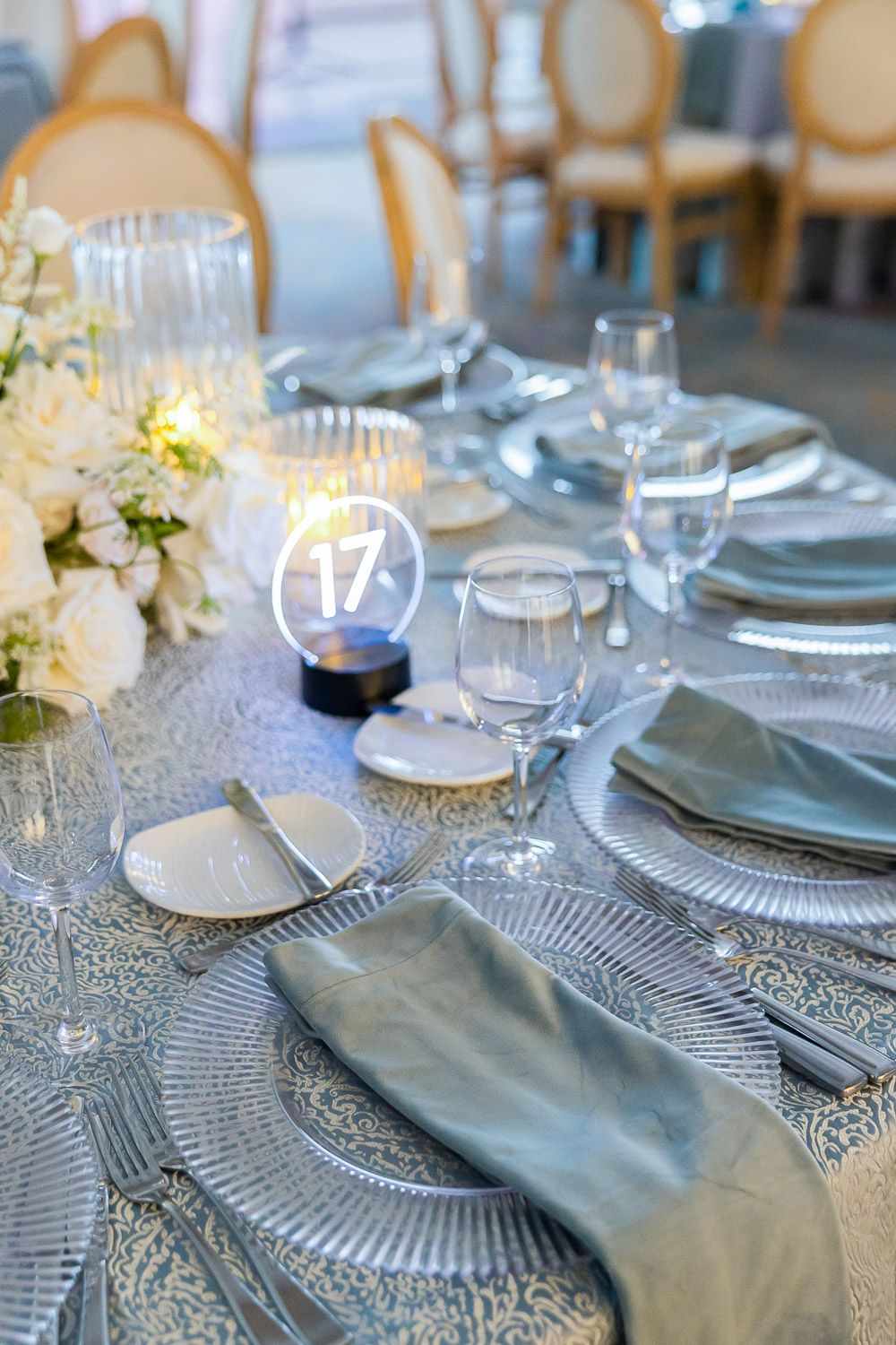 Elegant table setting setup with dinnerware at a corporate gala.