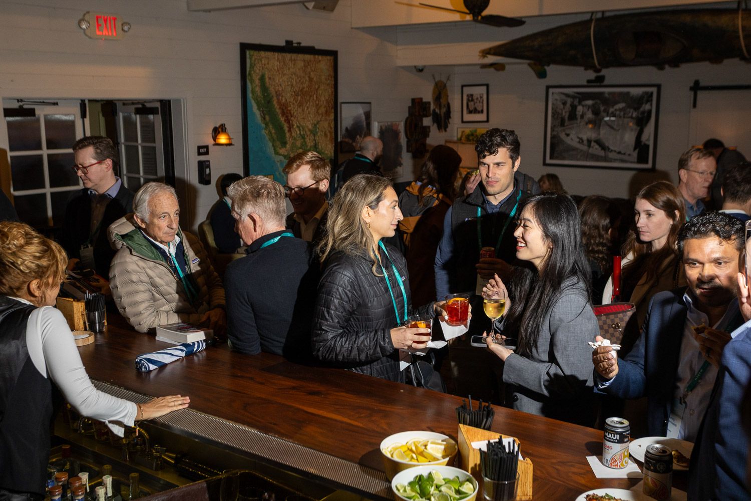 Group of conference attendees at the closing party of a summit.