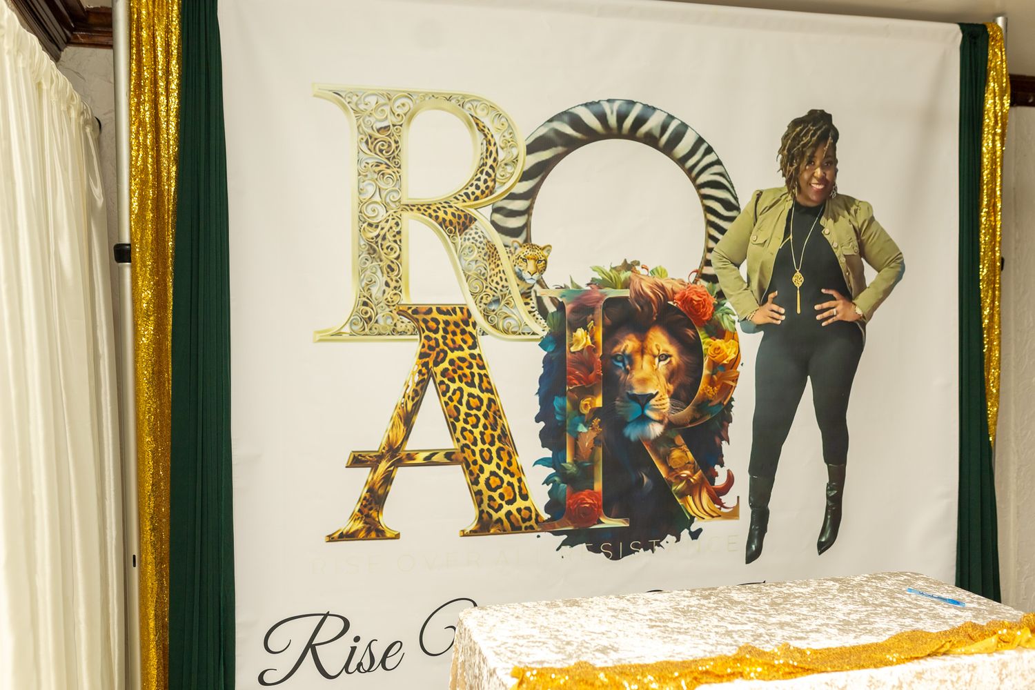 This photo features a large banner with the word 
