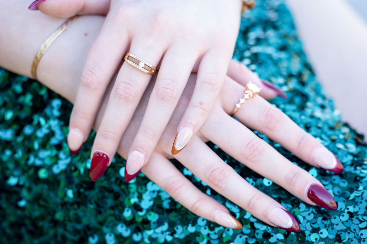 Formal senior portrait photography session in nature setting, close up of her hands showing off her jewelry, Windsor Ontario.