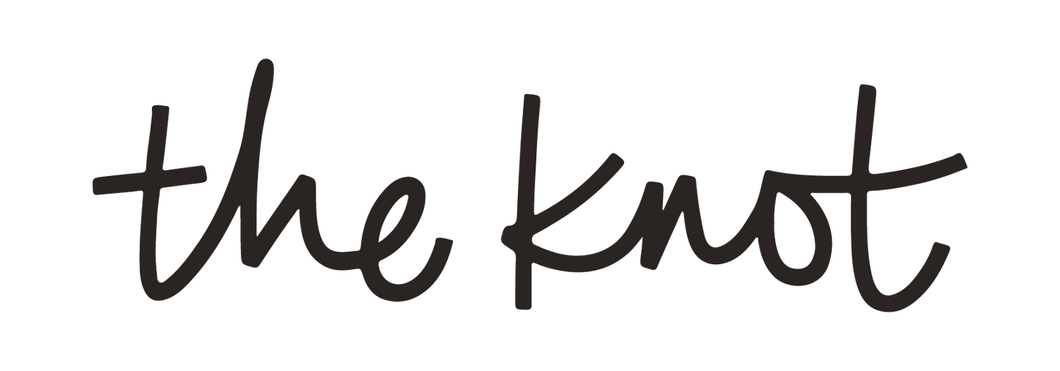 Vintage text logo design with decorative flourishes and the word 'The Knot' in an elegant script style.