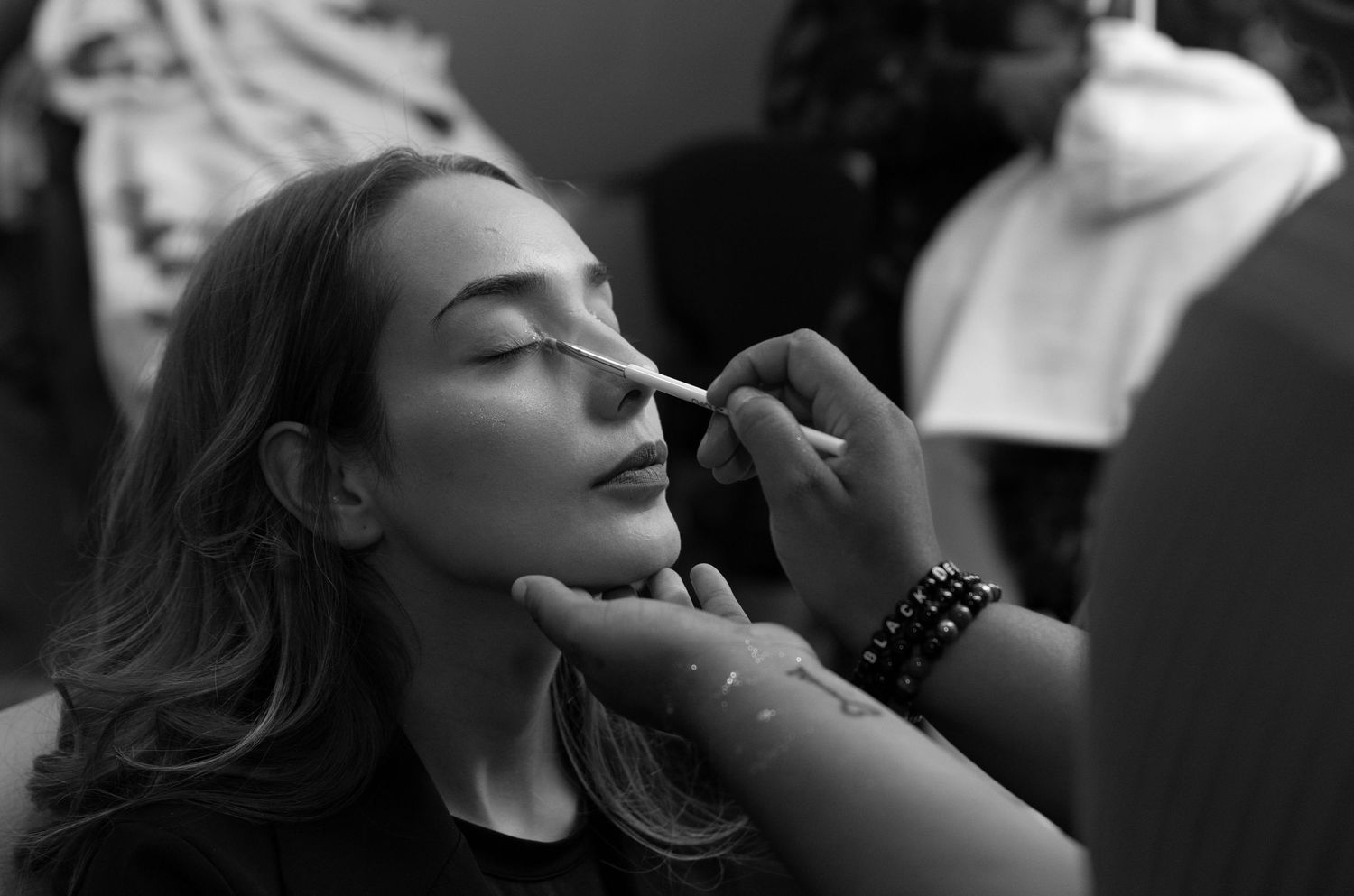 Behind the scenes makeup artist working for fashion show