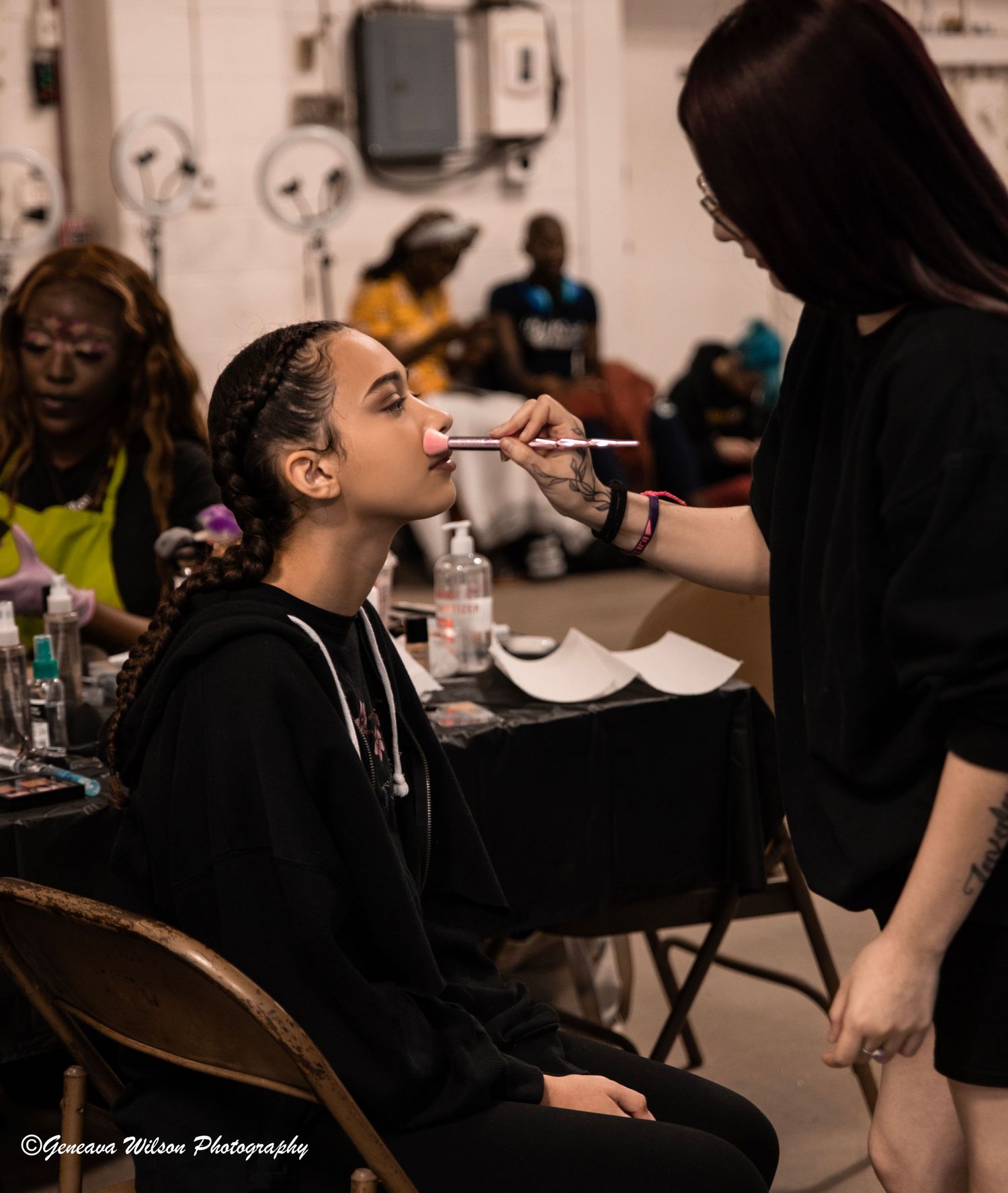 Makeup artist working before fashion show in Peoria, IL