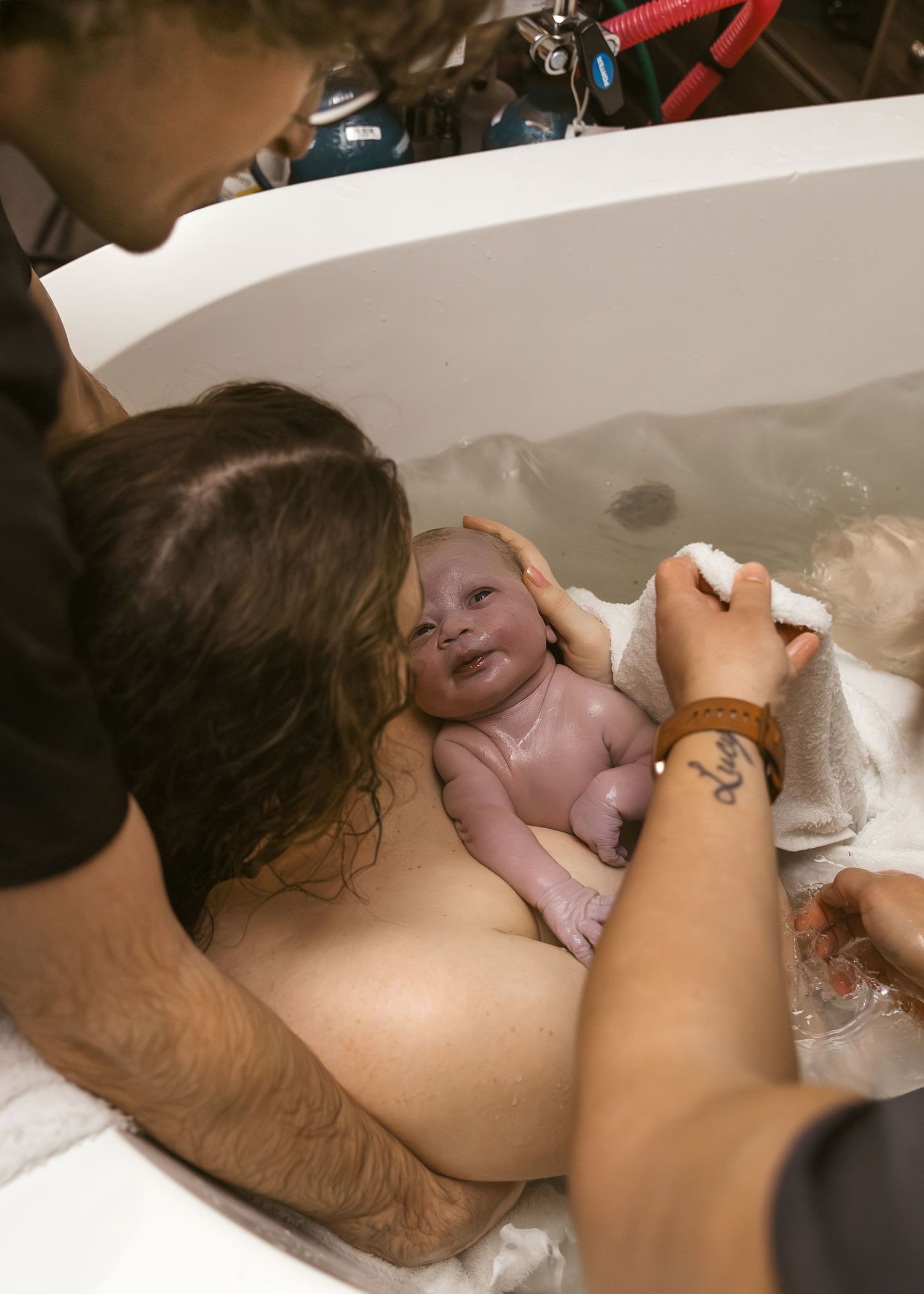 Birth Photography in tub in Bloomington, IL