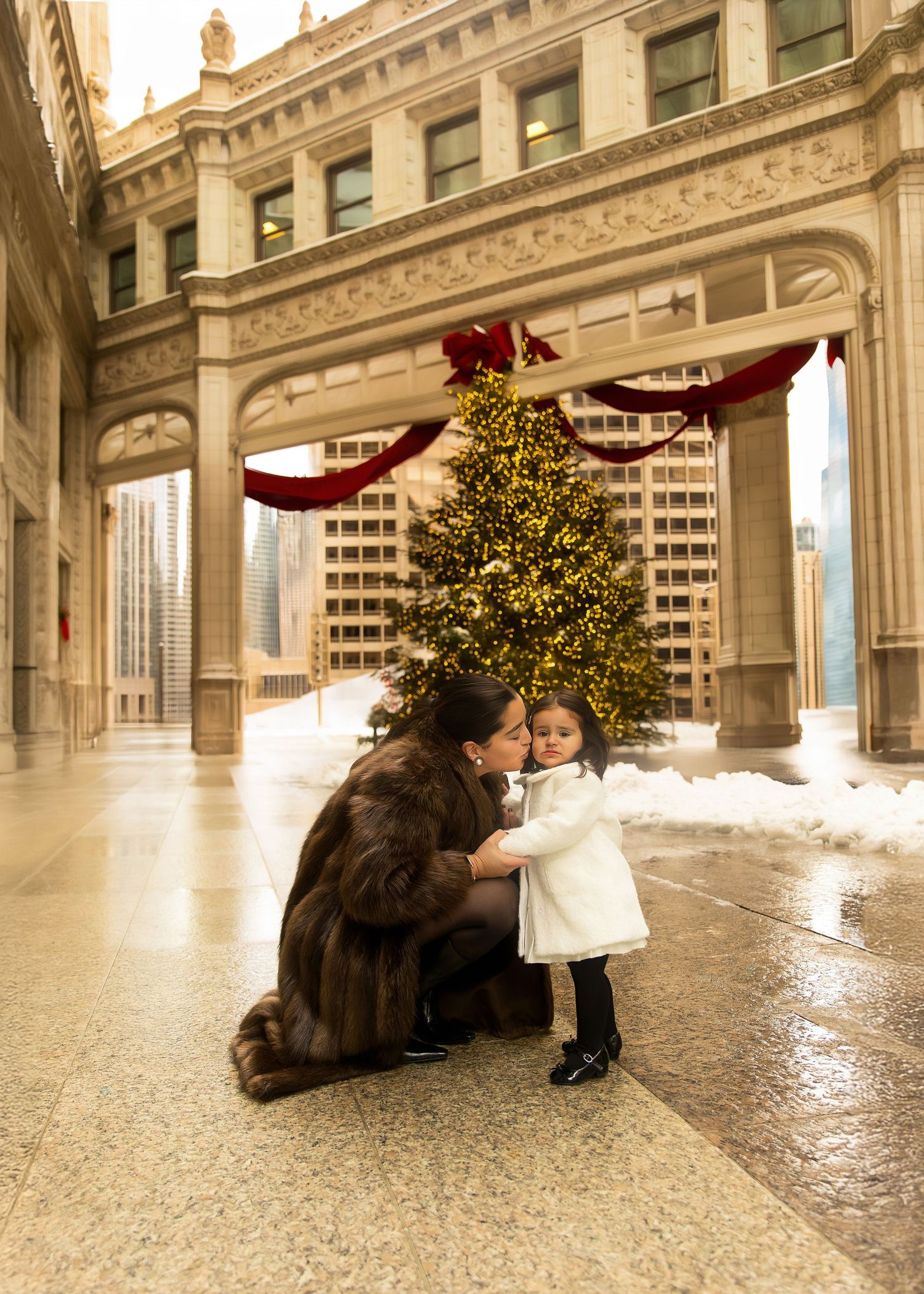 Christmas photography session at the Wrigley Building in Chicago, Mommy & me christmas photo with kisses