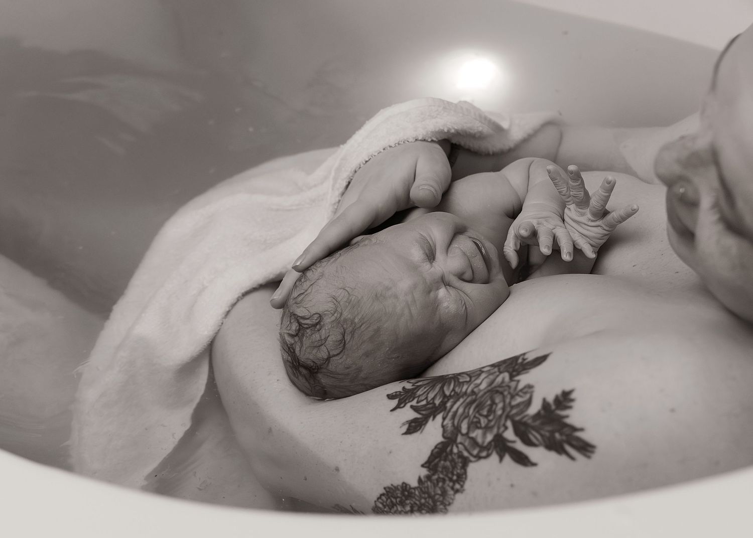 Birth Photography in tub in Bloomington, IL