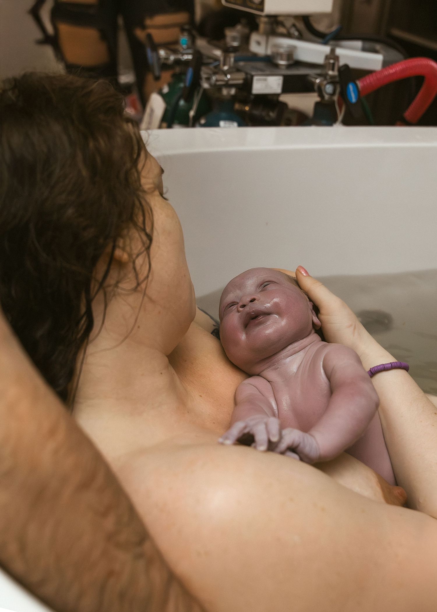 Birth Photography in tub in Bloomington, IL