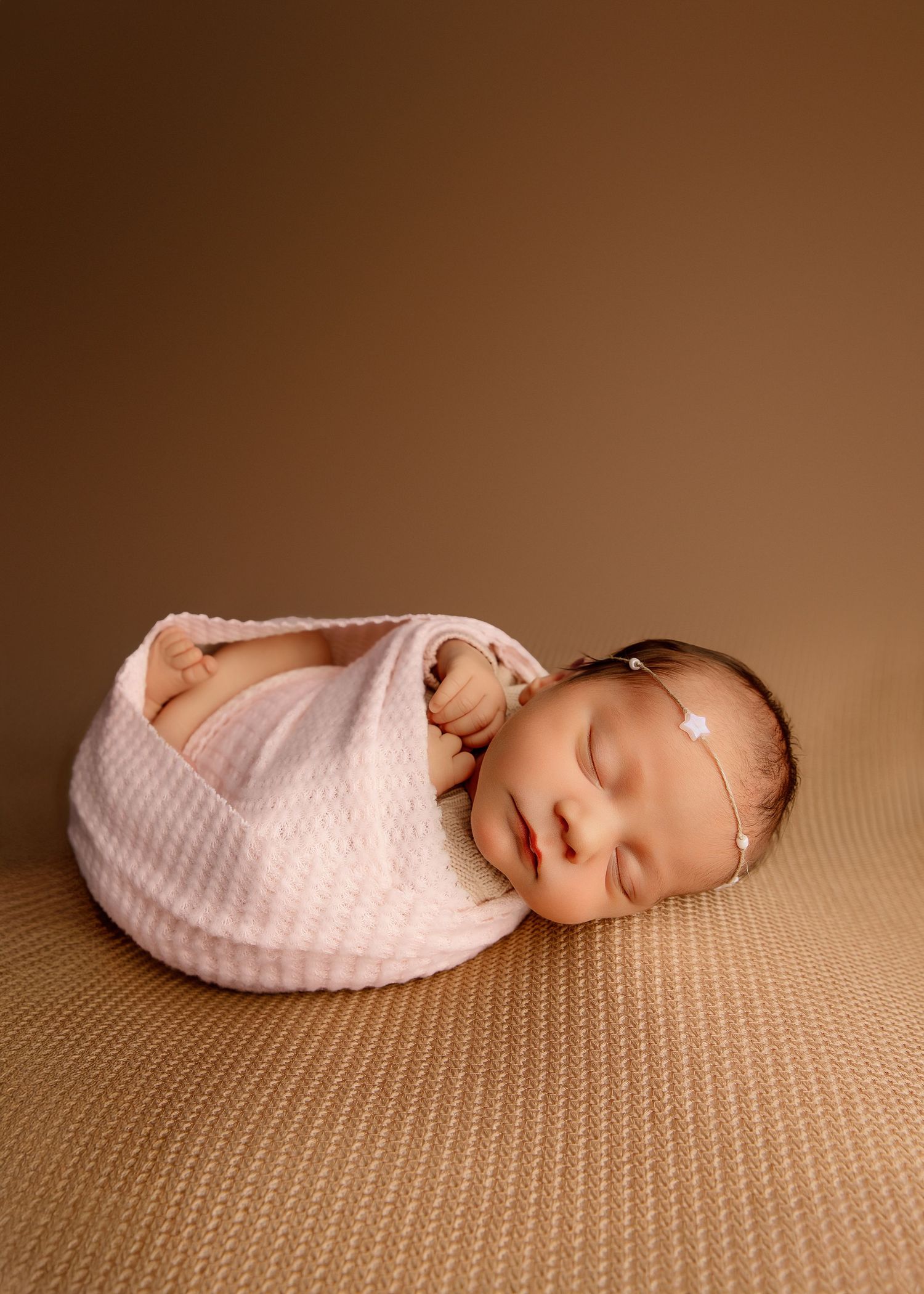 Posed Newborn Session in studio in Peoria, IL