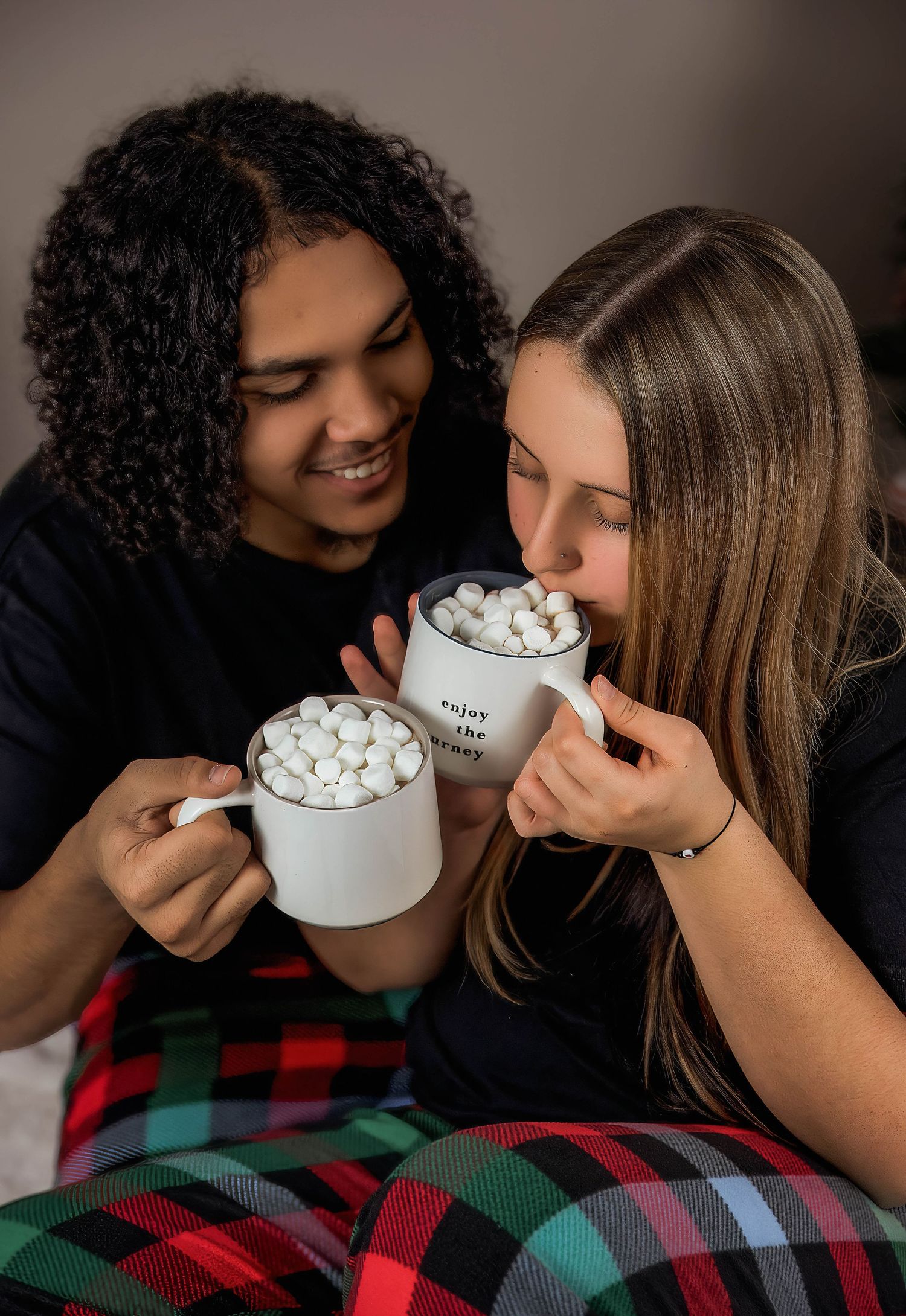 In-studio couples Christmas portrait in Peoria, IL