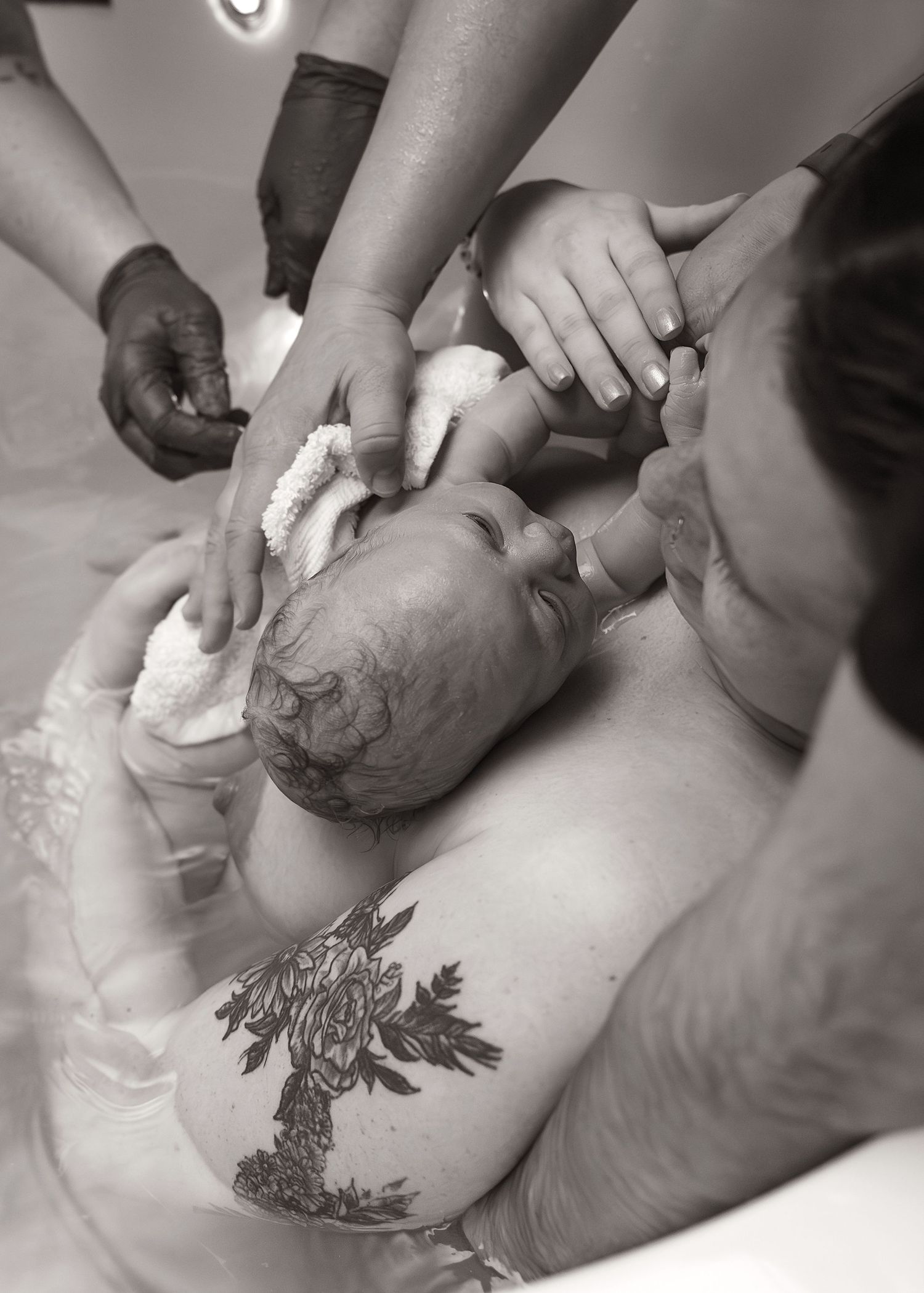 Birth Photography in tub in Bloomington, IL