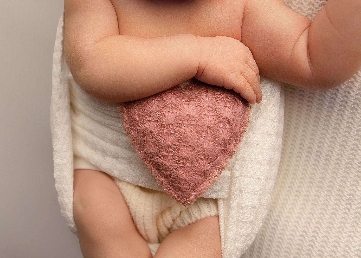 Posed newborn session in studio in Peoria, IL