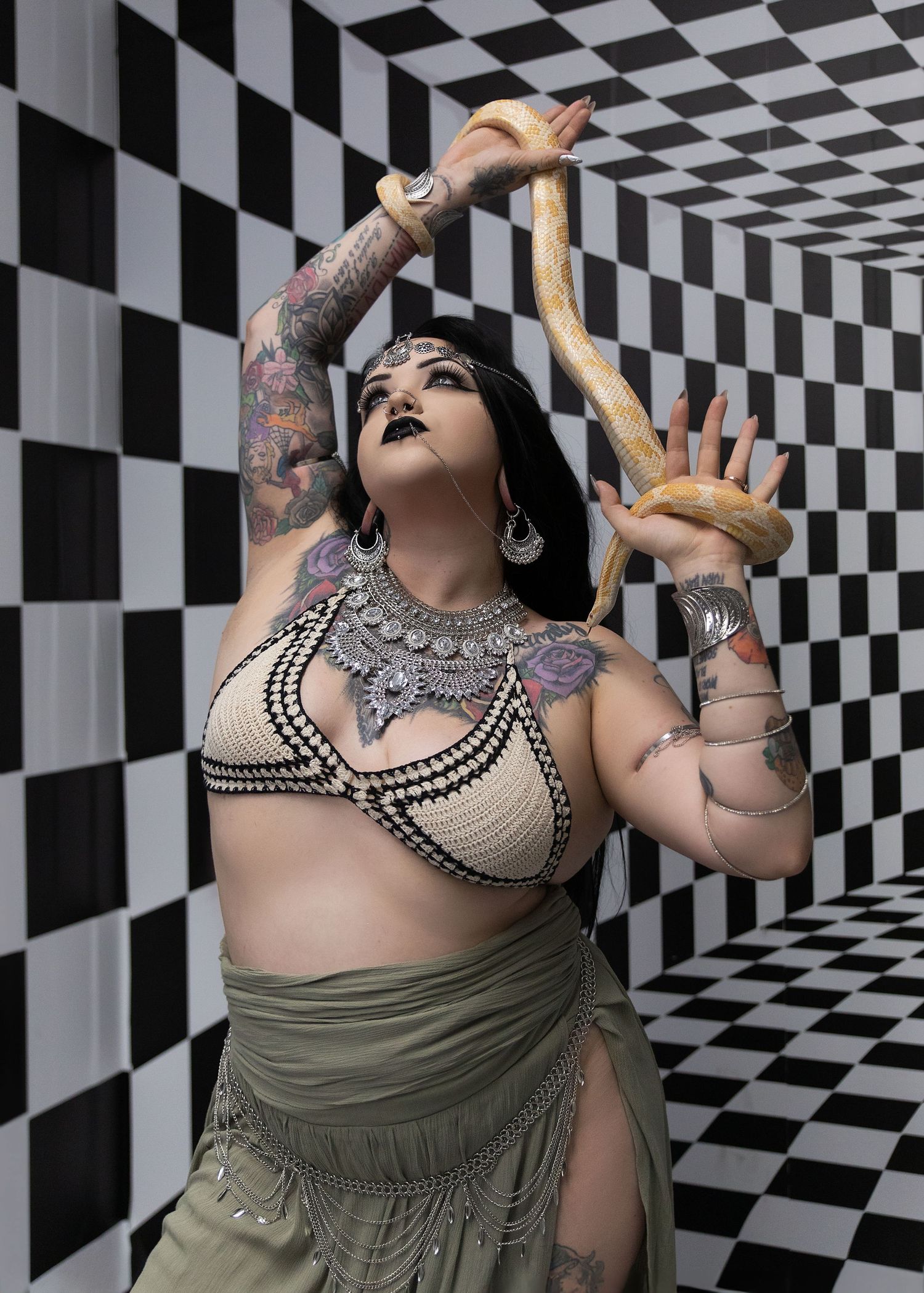 Creative snake photoshoot with detailed background and creative posing in Aurora IL