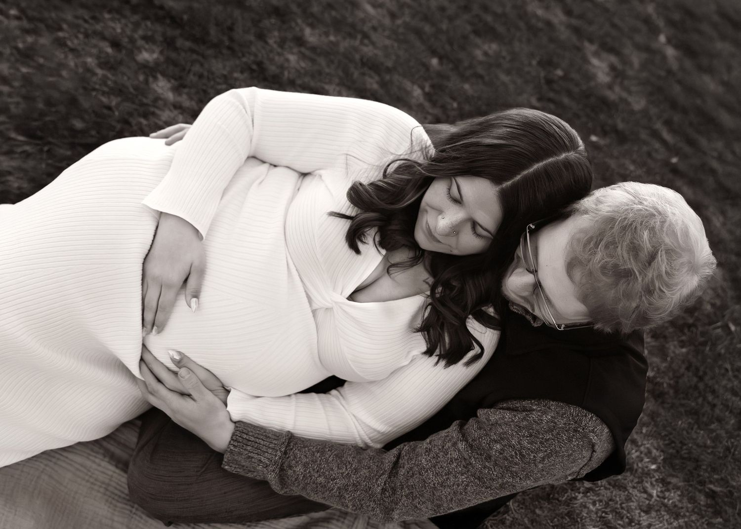 Black and white maternity photo with only mom and dad at Donovan Park in Peoria, expecting a baby boy