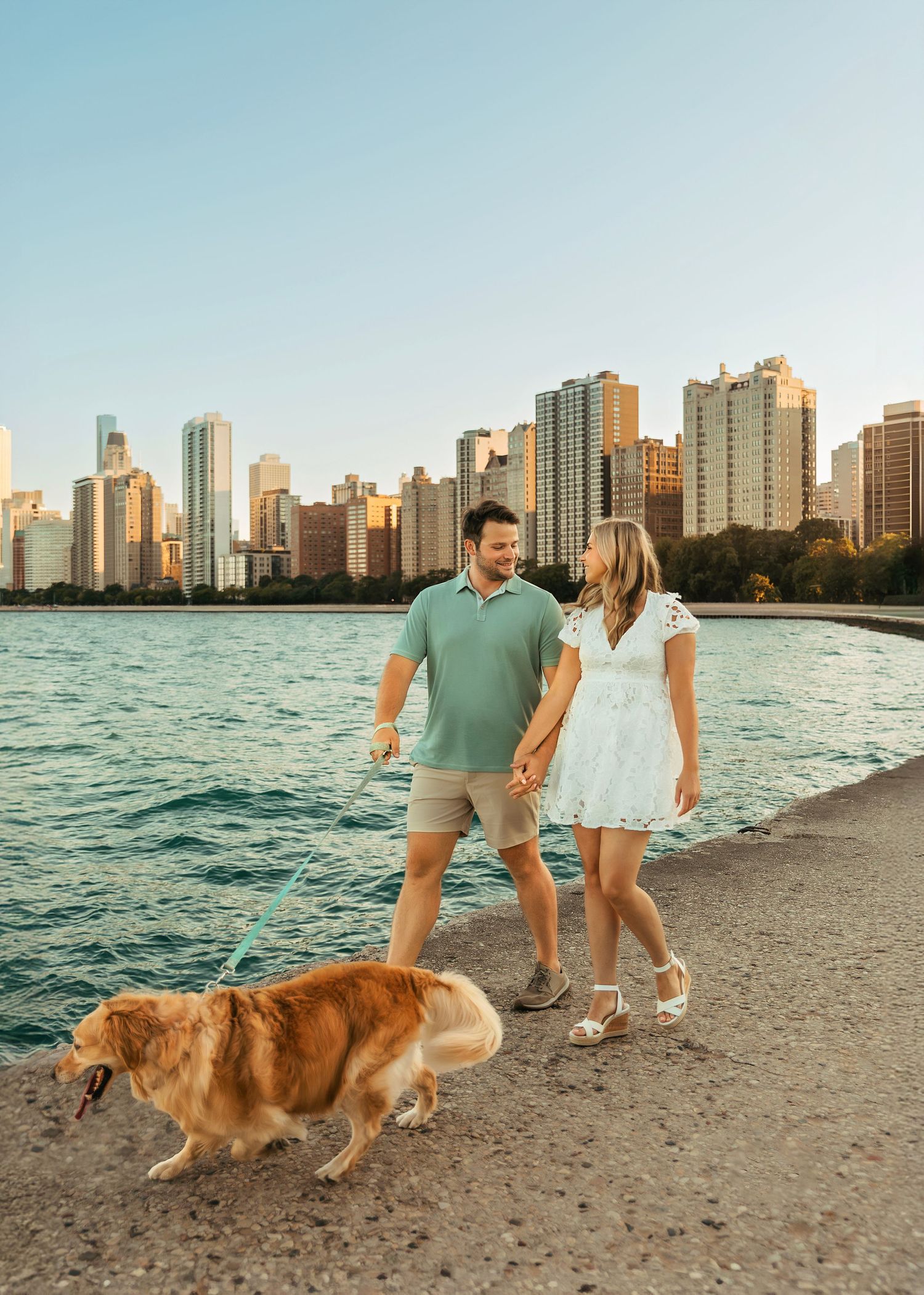 Couples Engagement Session with dog at North Avenue Beach in Chicago Illinois