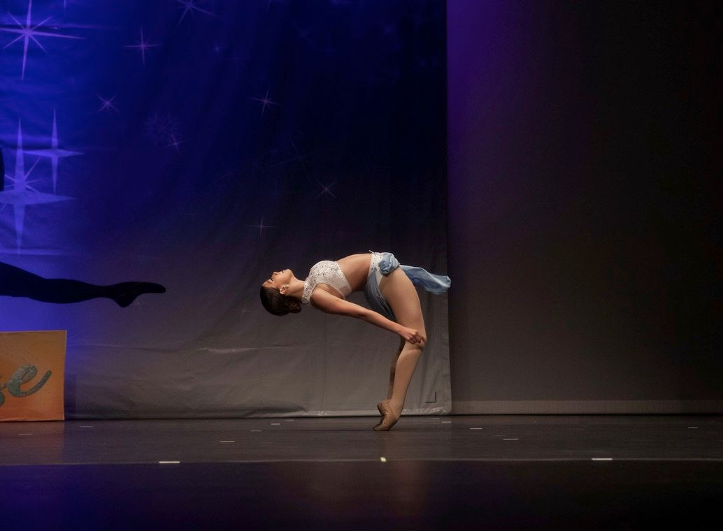 Toe rise action shot during MLSD dance recital with Lily Williams