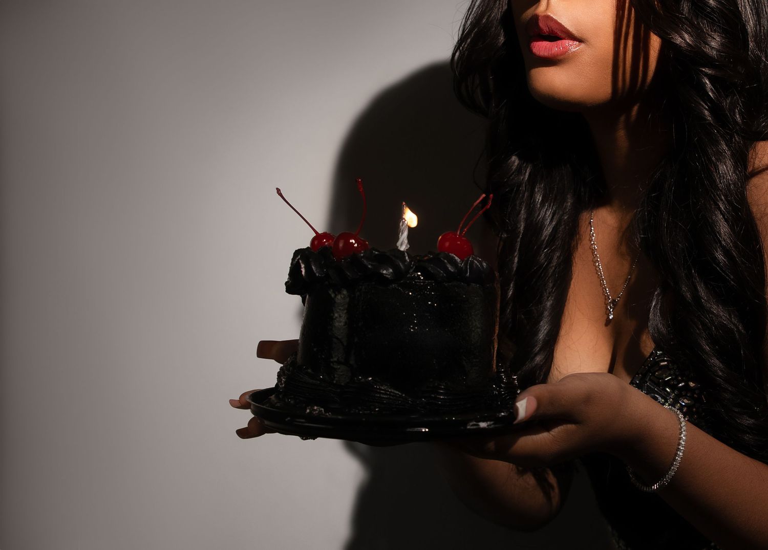 Peoria IL individual birthday portrait capturing personality and expression with spotlight lighting