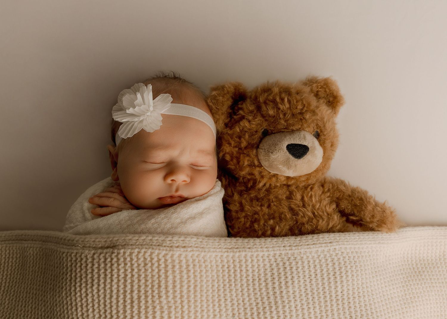 Posed Newborn session in-studio in Peoria Illinois