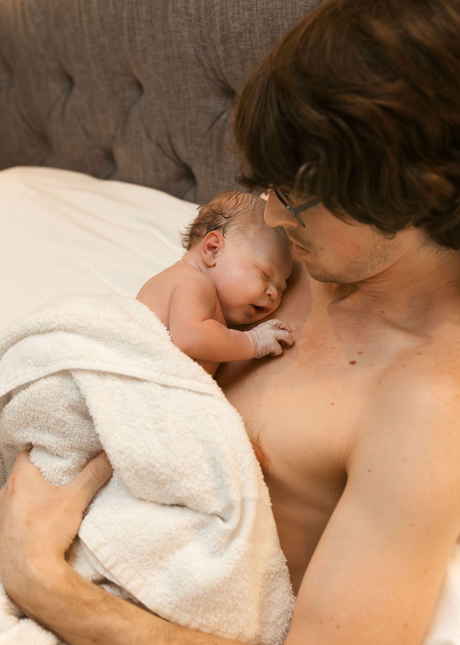 Birth Photography with dad in Bloomington, IL