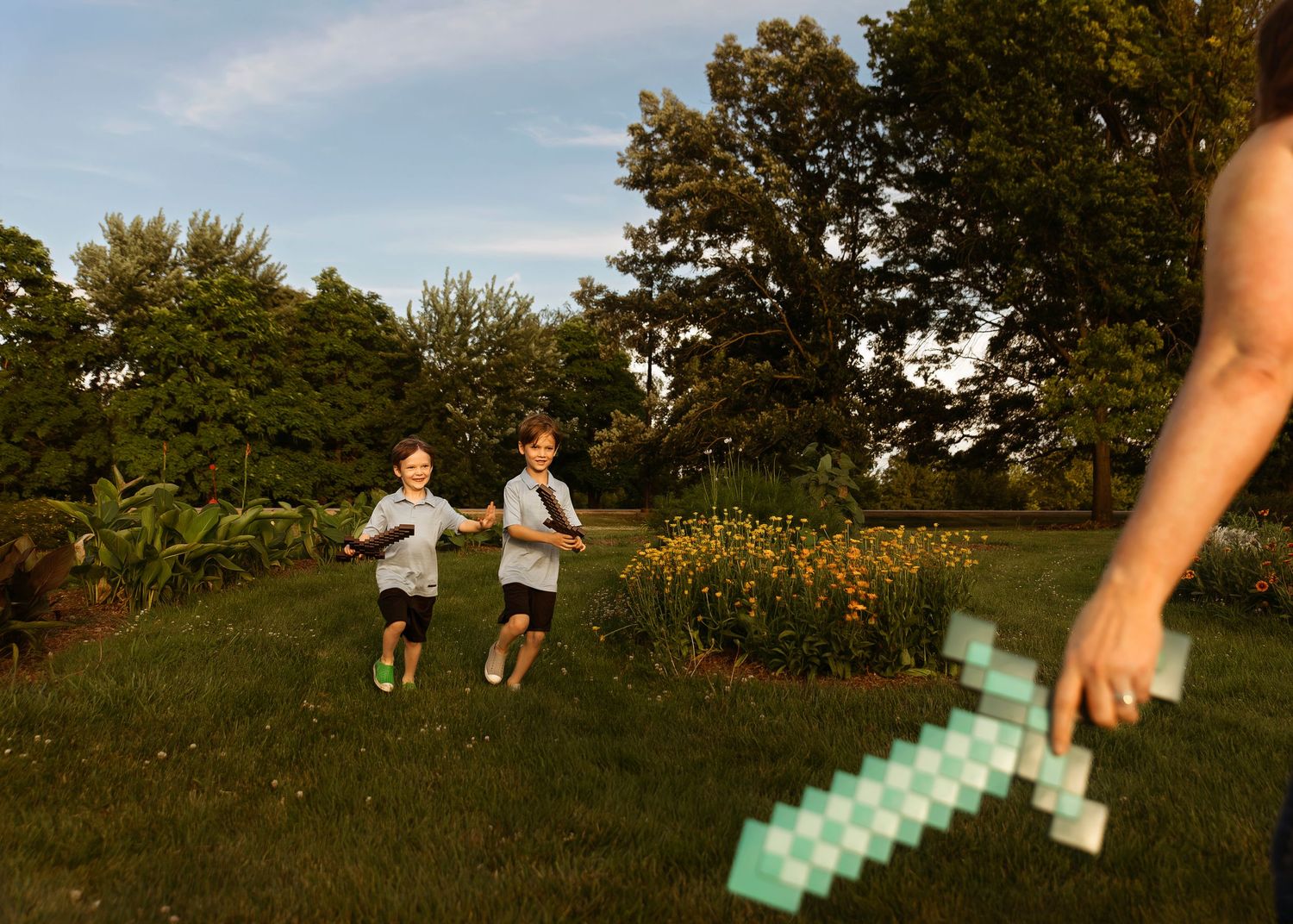 Lifestyle/documentary family session in East Peoria, IL including playful Minecraft swords