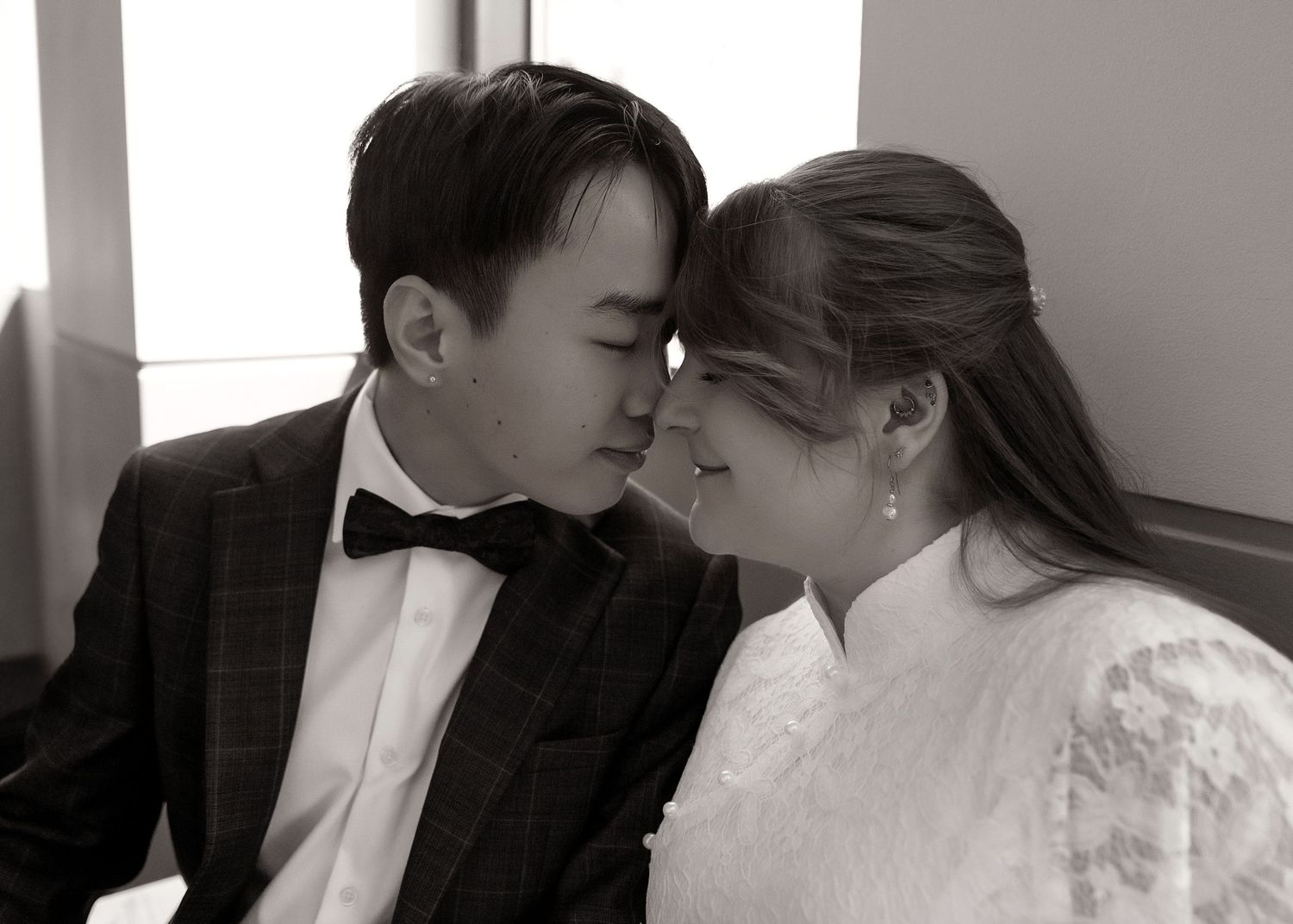 Touching noses before Peoria County courthouse wedding