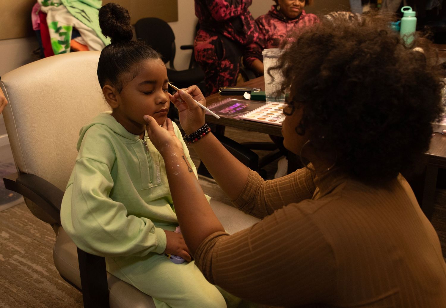Behind the scenes makeup artist working for fashion show