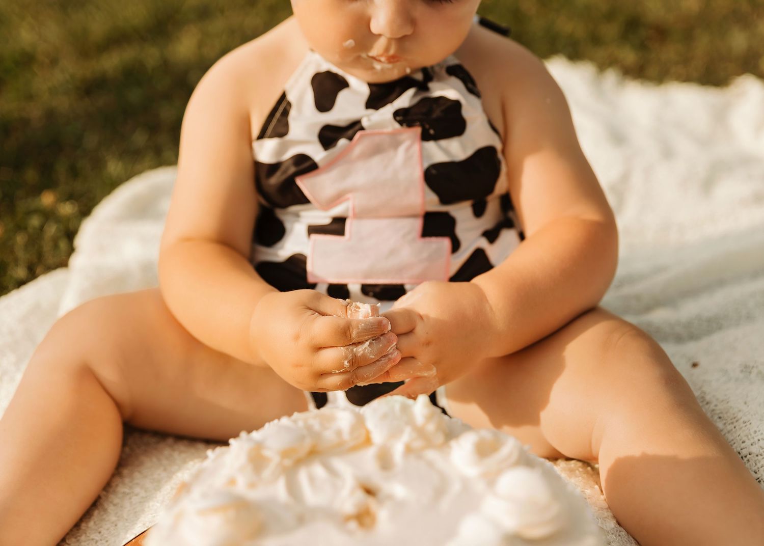 Chicago IL 1st birthday portraits with playful expressions and textures