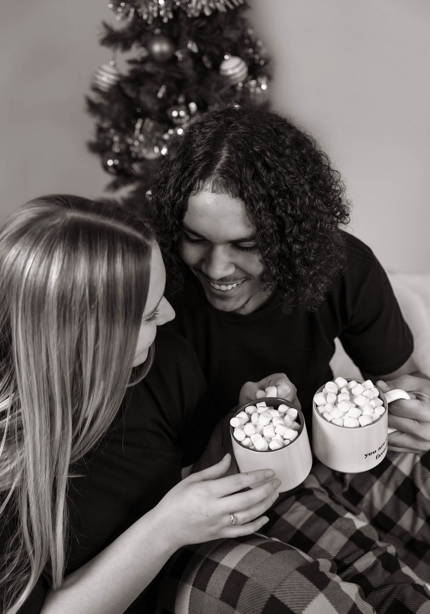 In-studio couples Christmas portrait in Peoria, IL