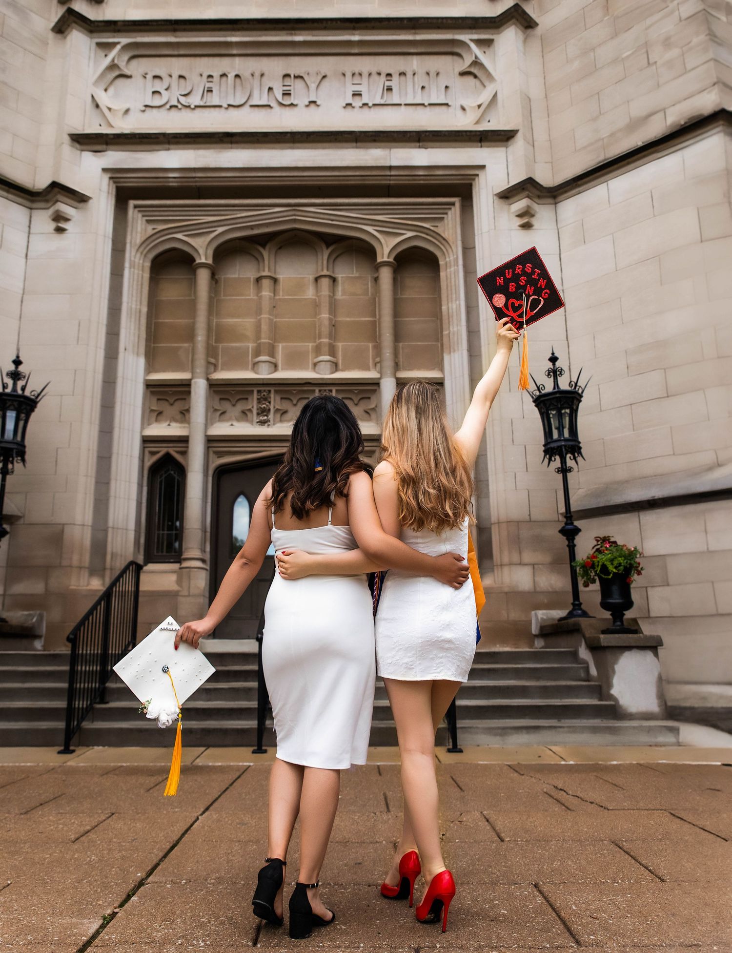 Group graduation session at Bradley University with classic lighting