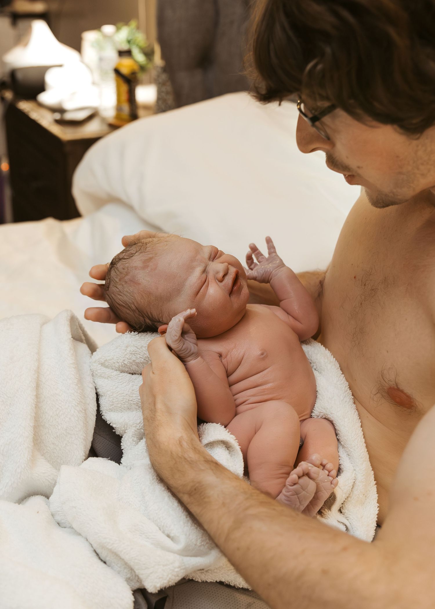 Birth Photography with dad in Bloomington, IL
