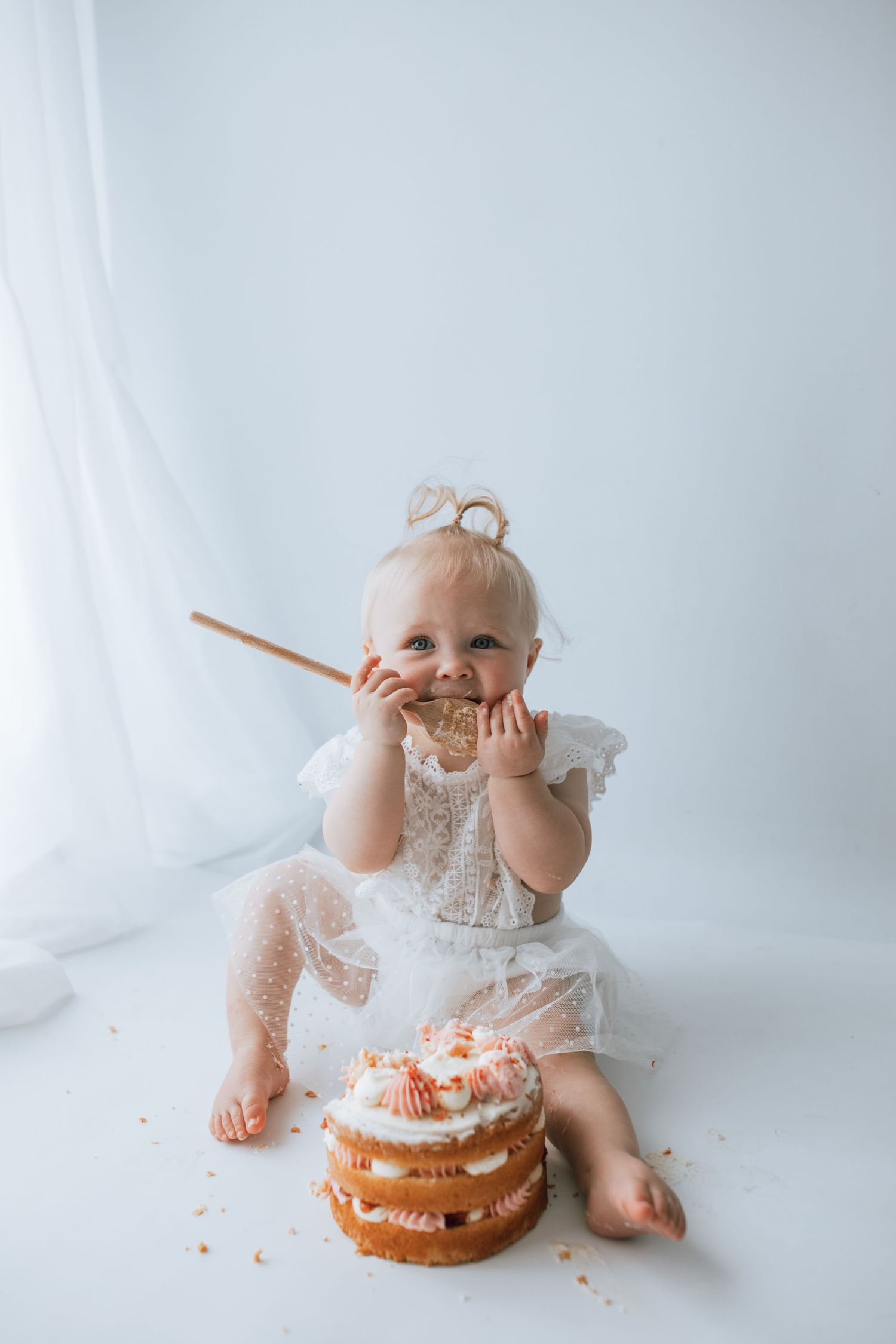 Young girl eating cake